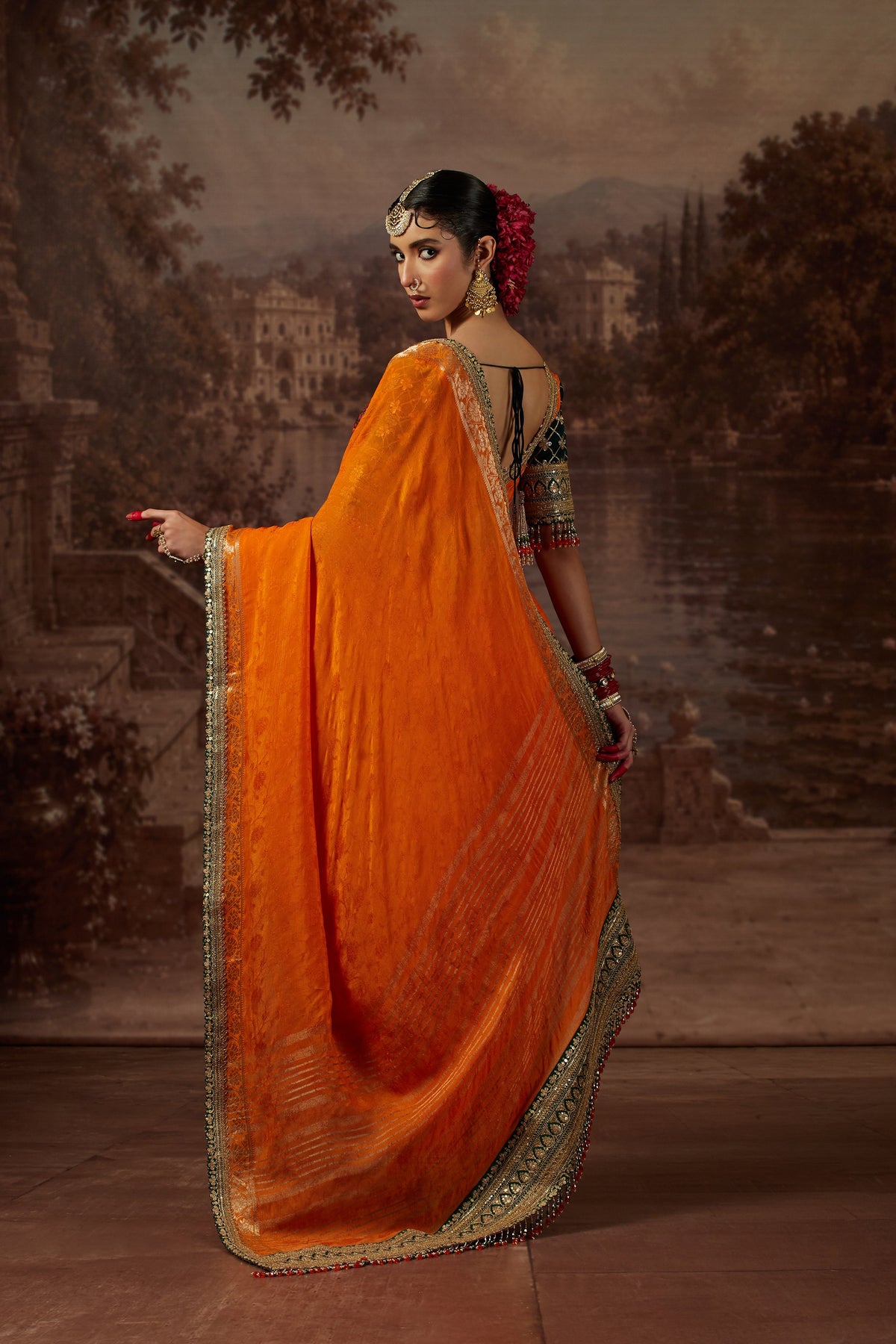 Orange Saree with Green Blouse