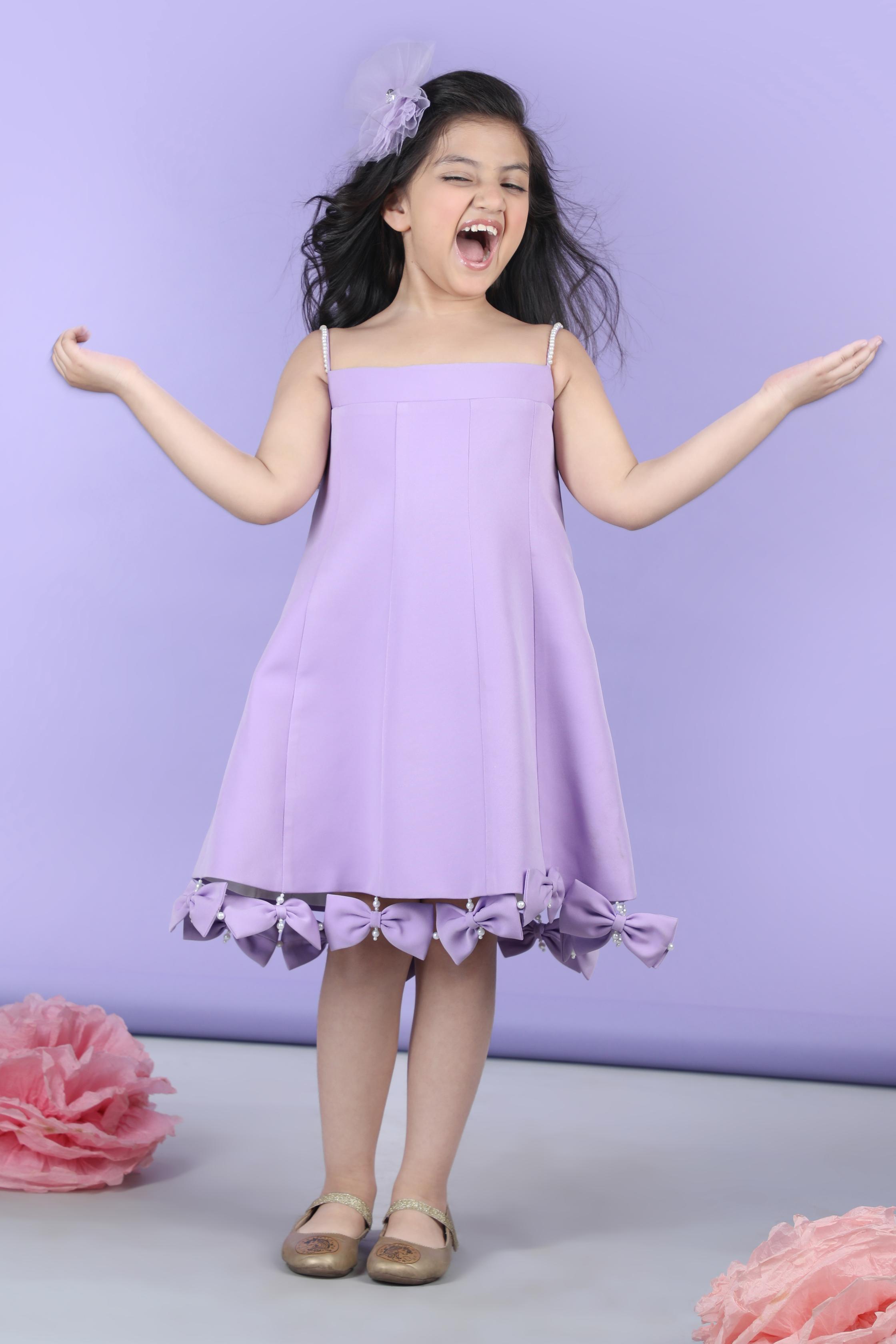 A Line Dress Embllished With Bow All Over The Flair