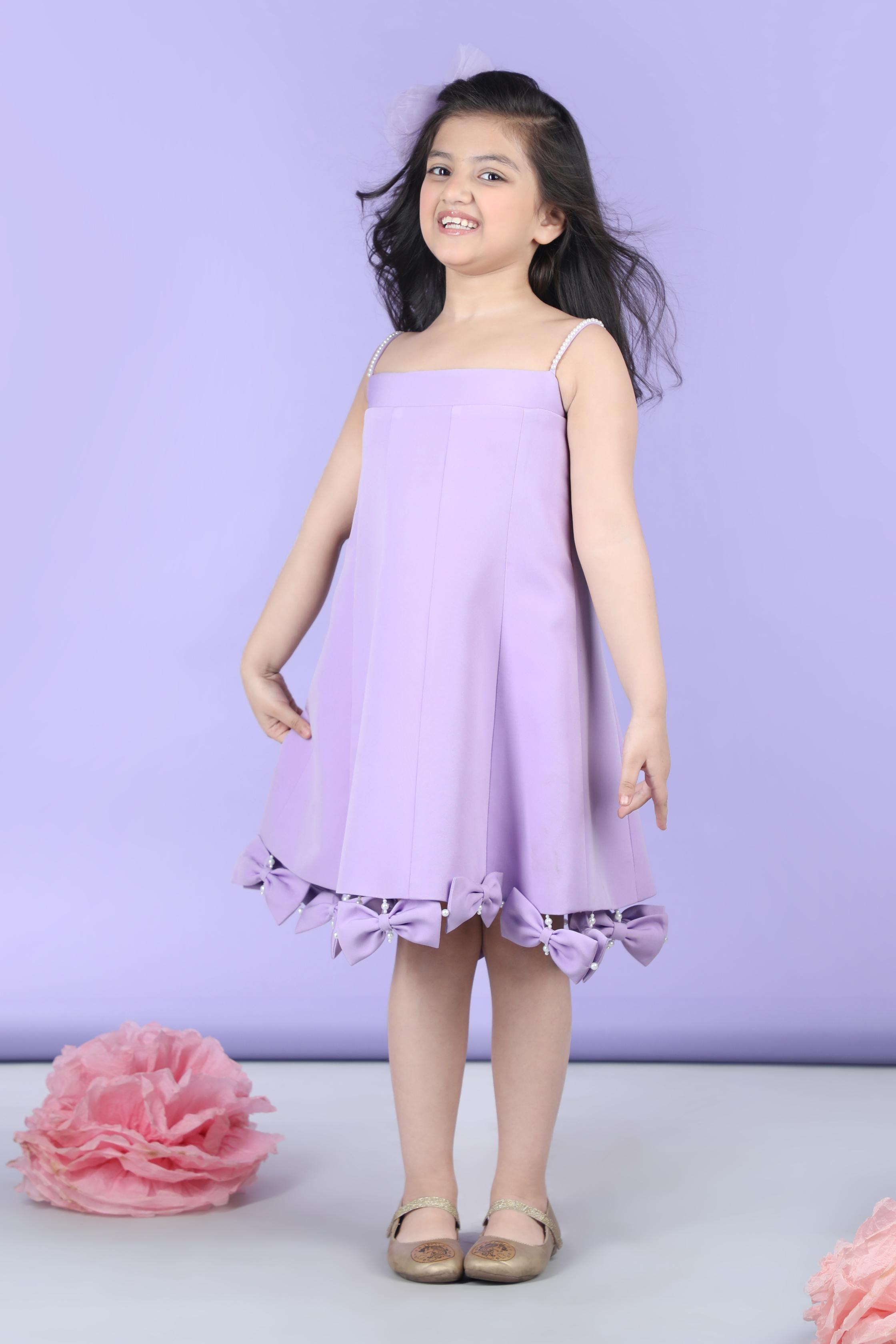 A Line Dress Embllished With Bow All Over The Flair