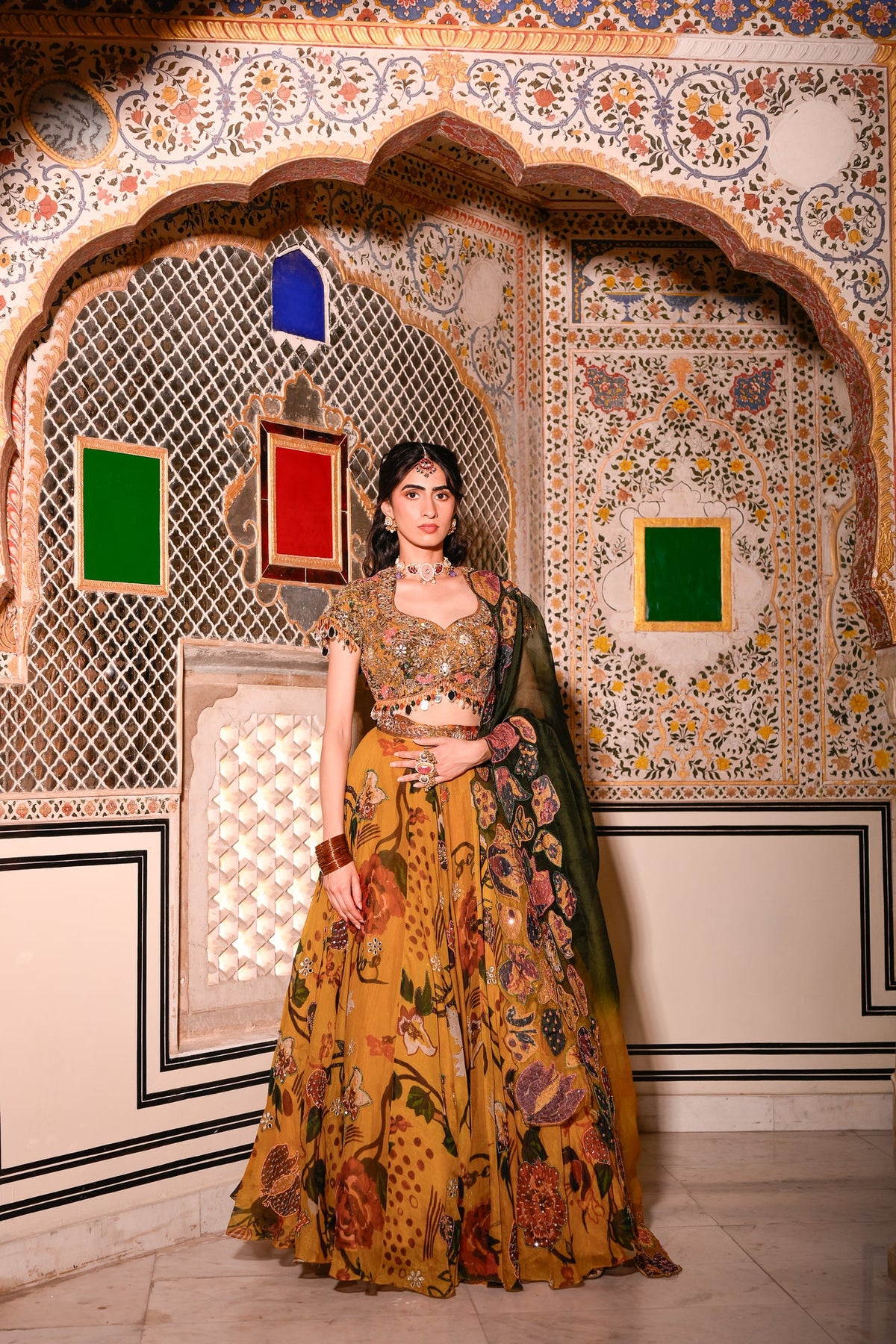 Emb Blouse Paired With Highlighted Lehenga With Applique Duel Cape
