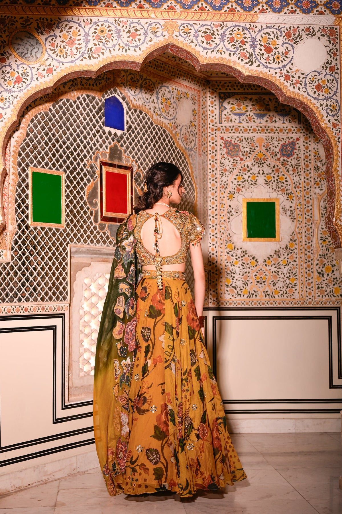 Emb Blouse Paired With Highlighted Lehenga With Applique Duel Cape