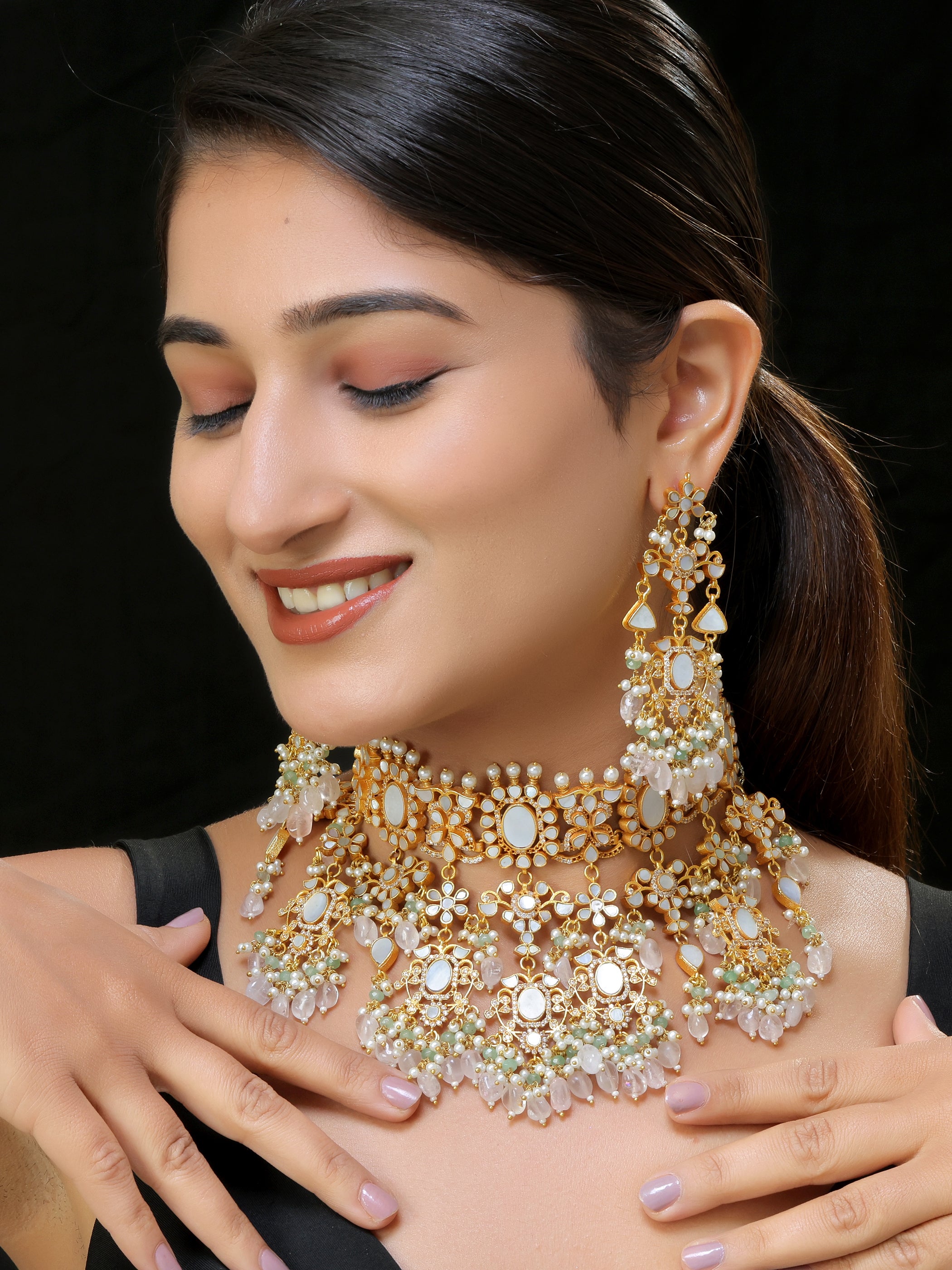 Gold finish Kundan and mother of pearls necklace set