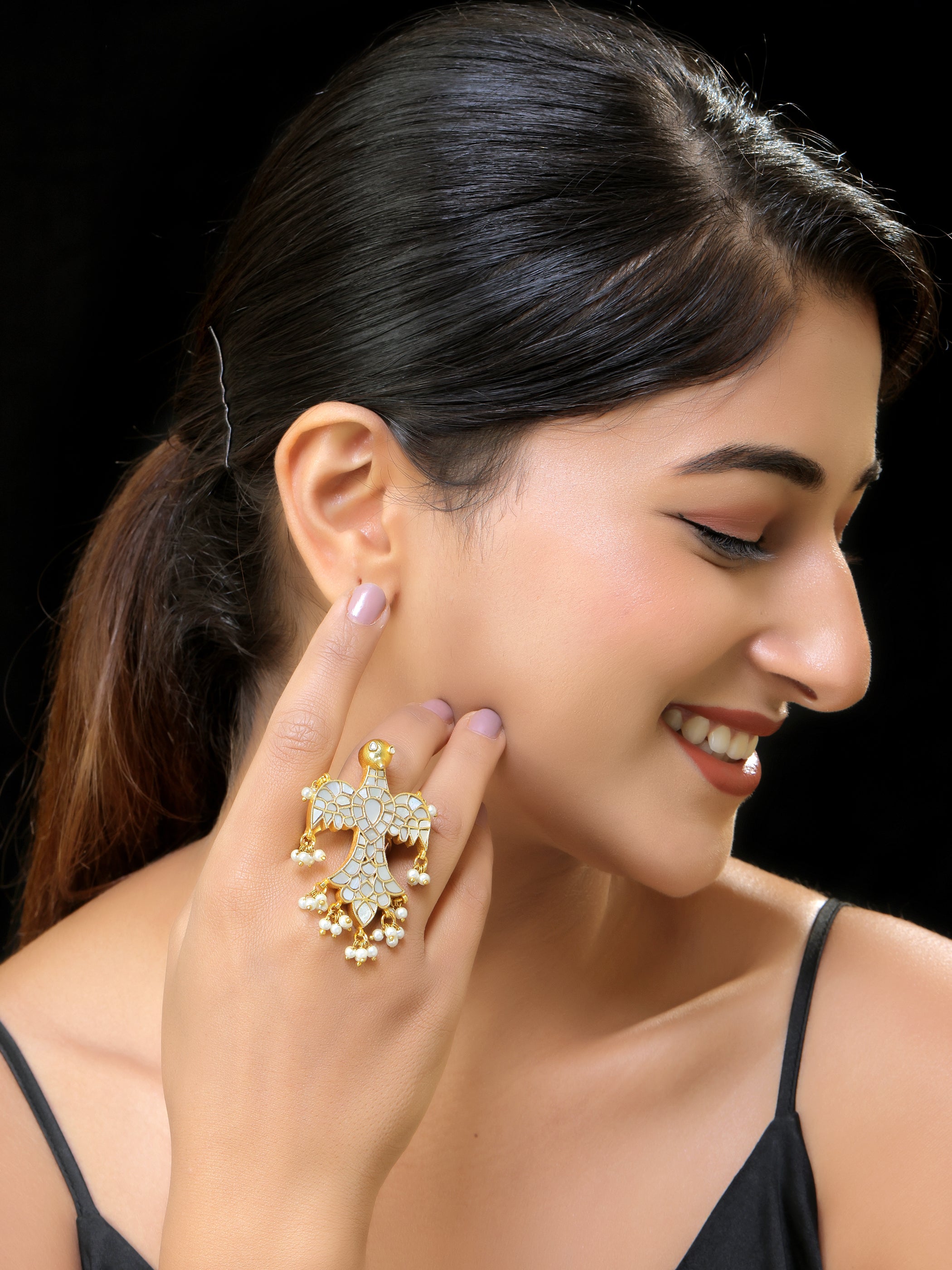 Gold finish kundan mother of pearls ring