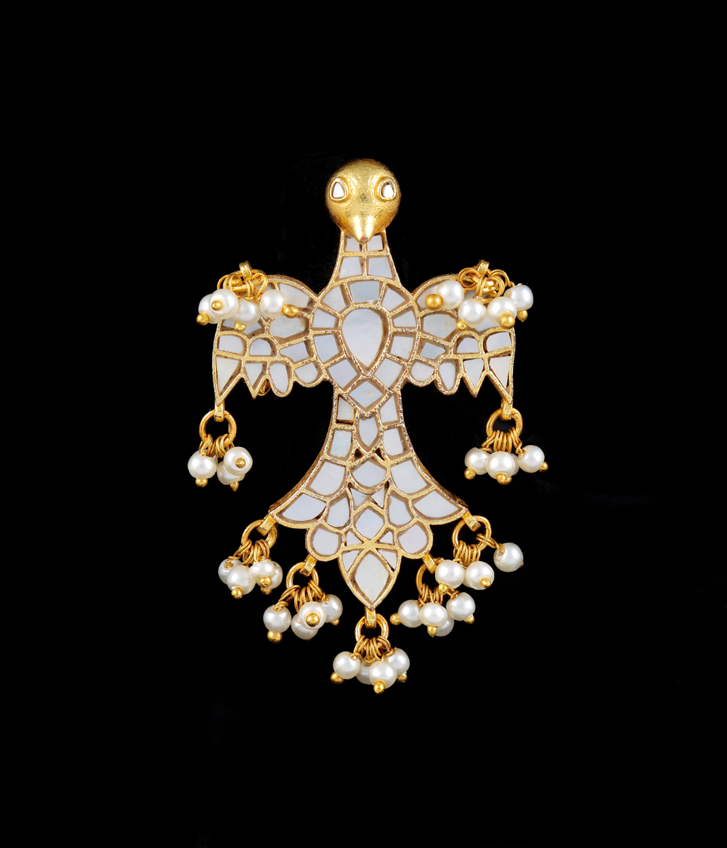 Gold finish kundan mother of pearls ring