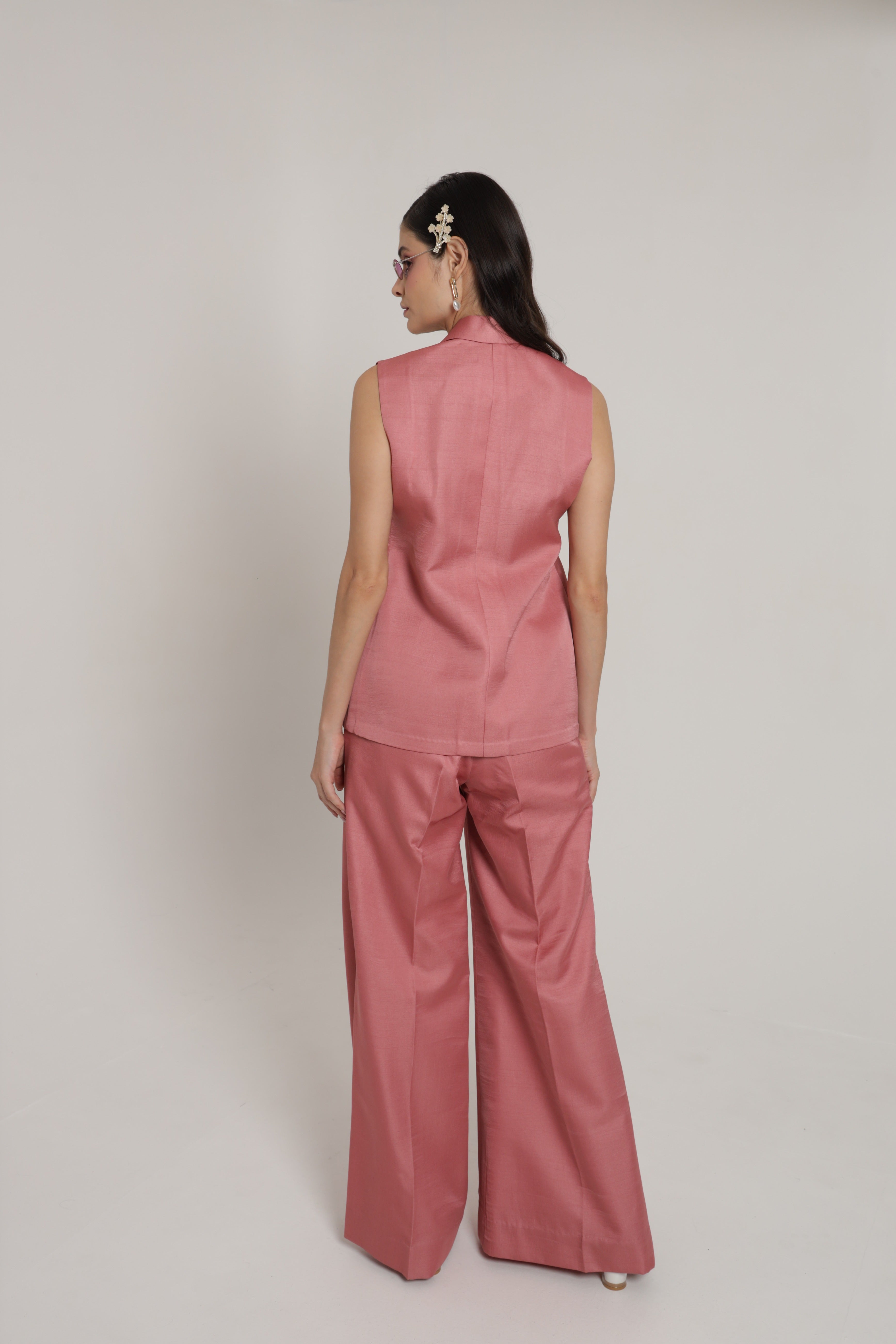 Pink peach sleeveless jacket with wideleg pant and bustier