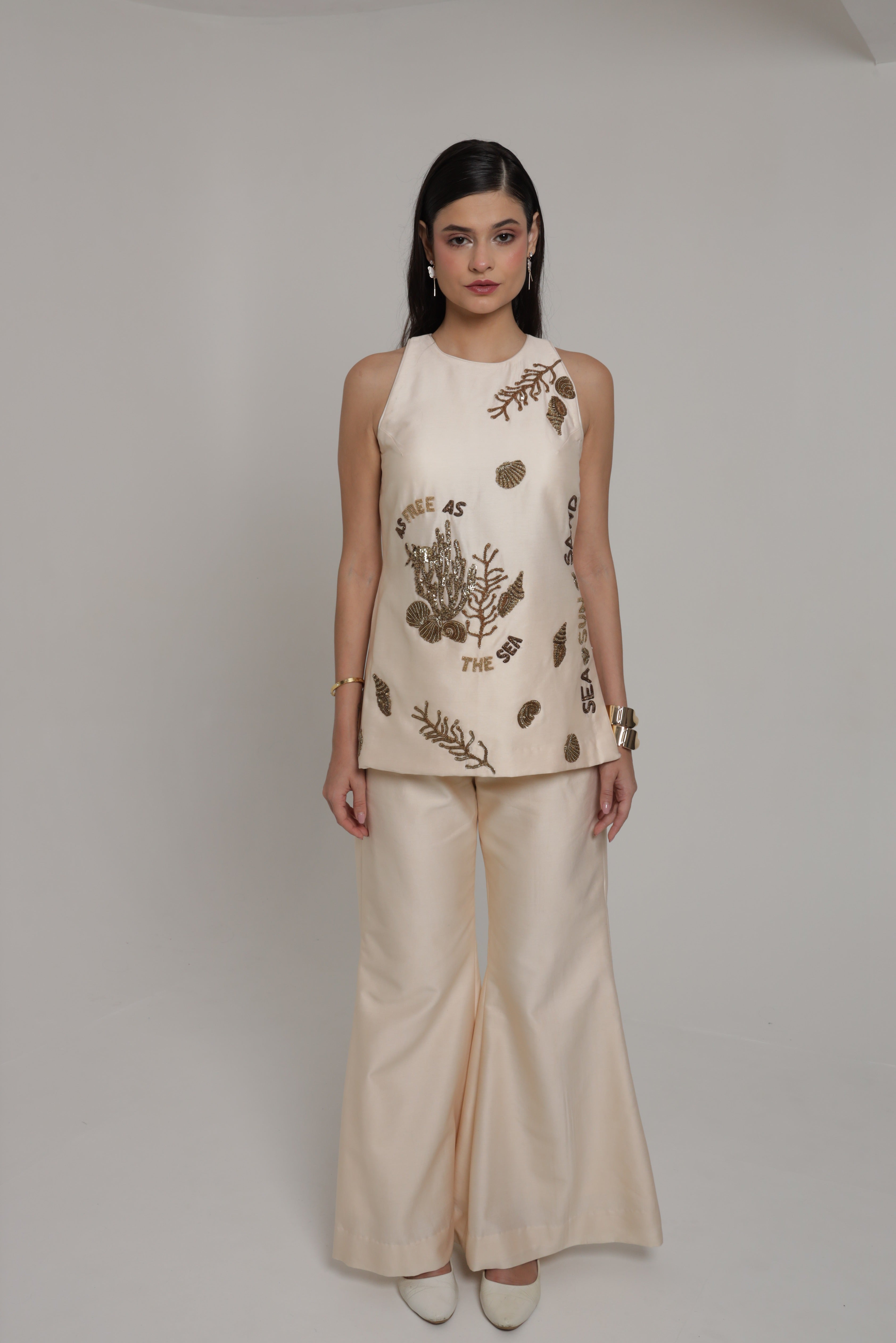 Beige halter neck top with wide leg pant