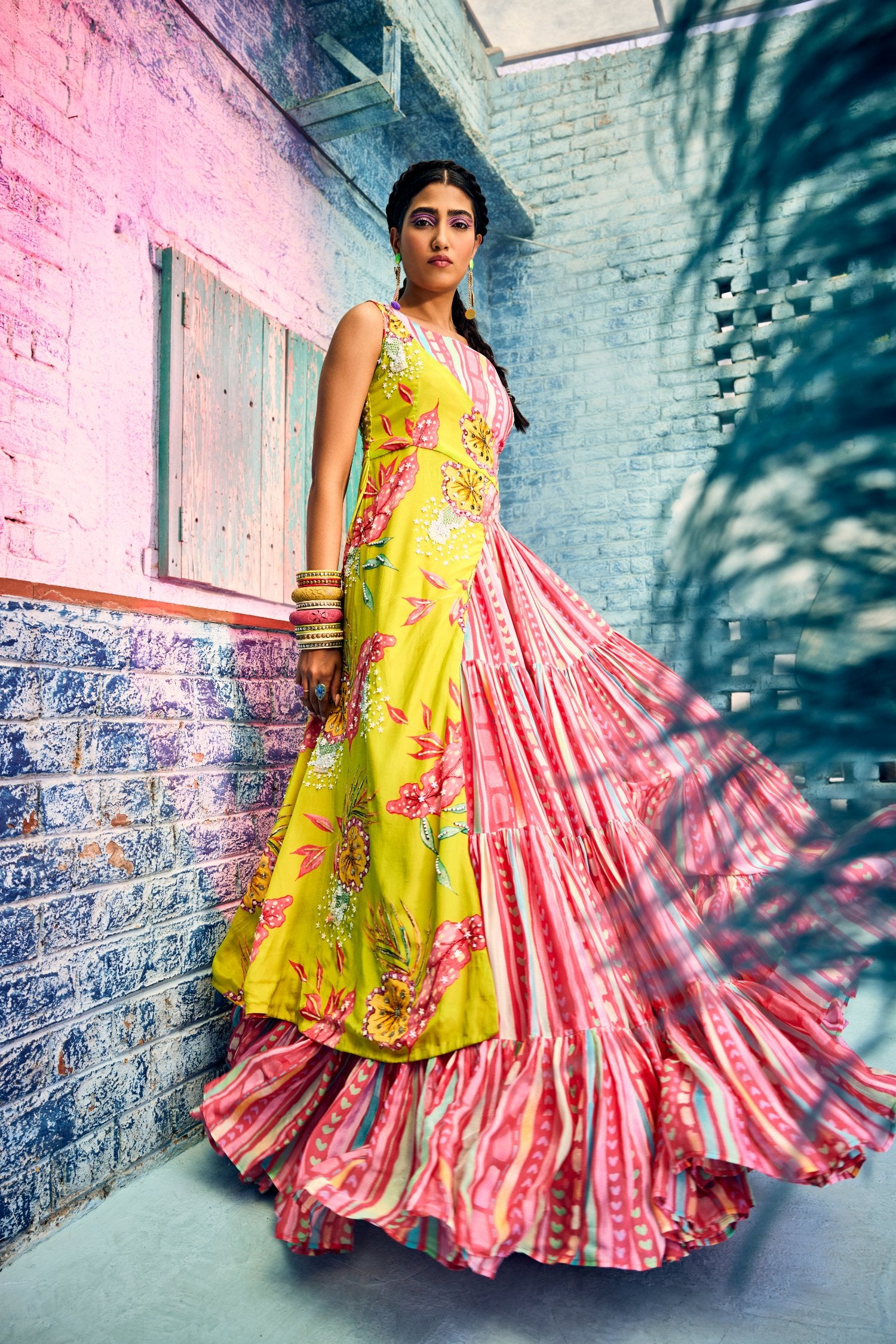 Beautiful candy color digital printed layered skirt with bustier and neon green one sided embroidered cape.