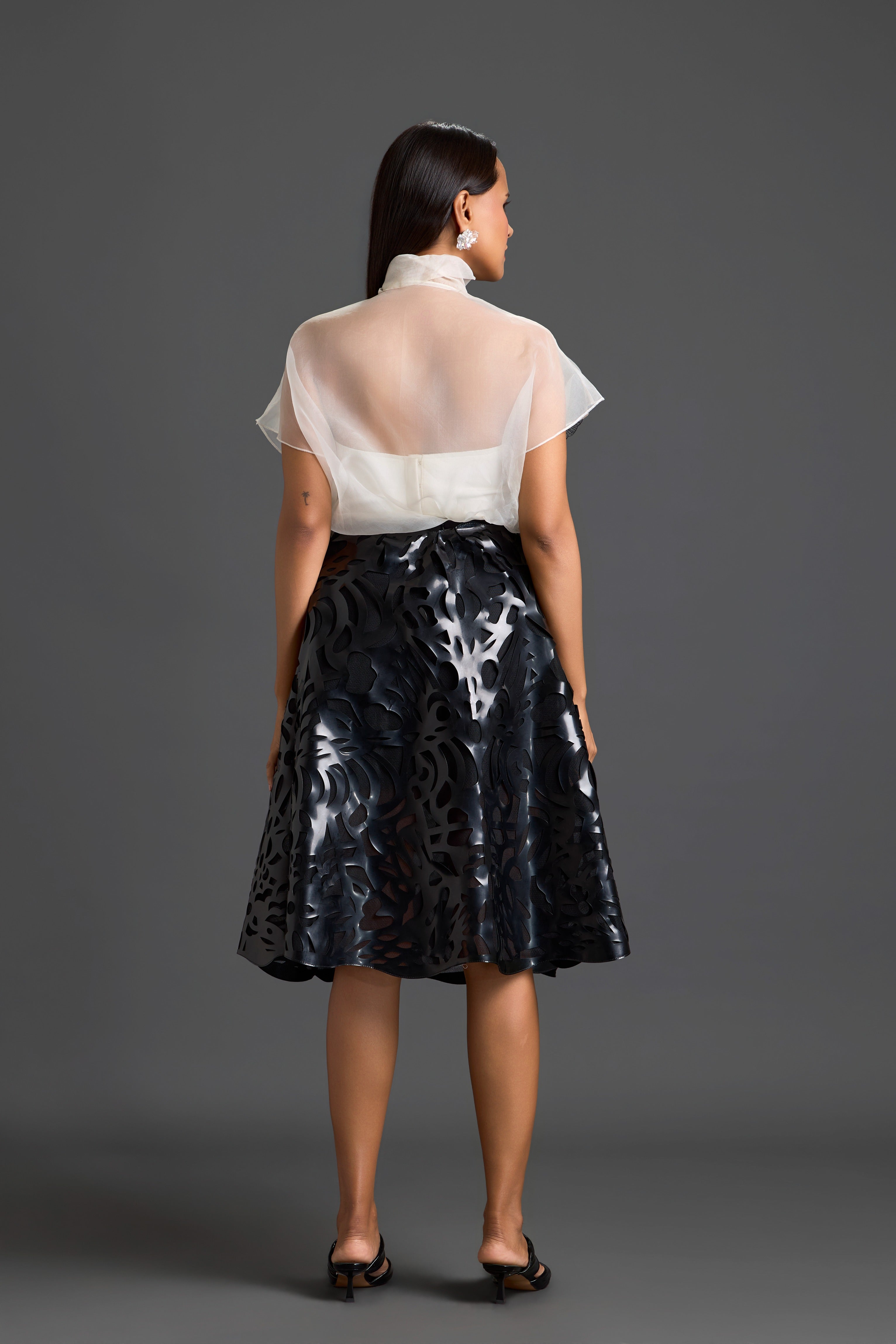 White Floral Top & Black Laser-Cut Skirt