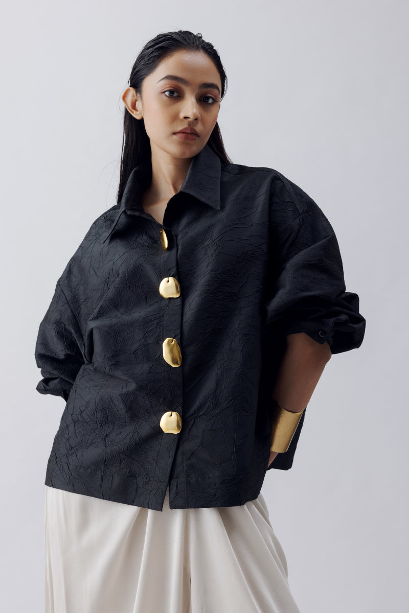 CRUSH SILK SHIRT WITH GOLD BUTTONS AND SATIN DRAPE SKIRT