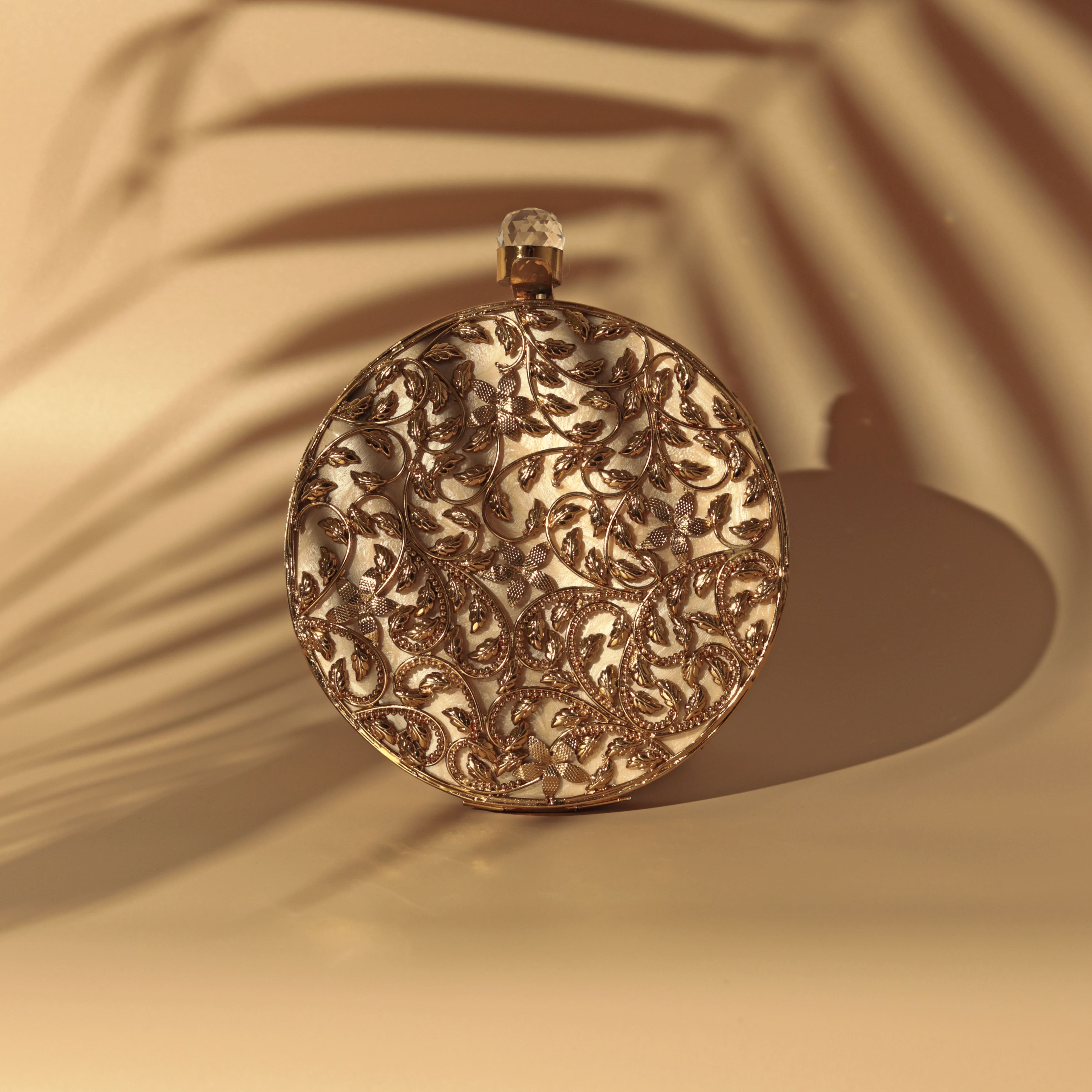 THE TAN CLAN Gazal Intricate Brass Work with Mother of Pearl Clutch