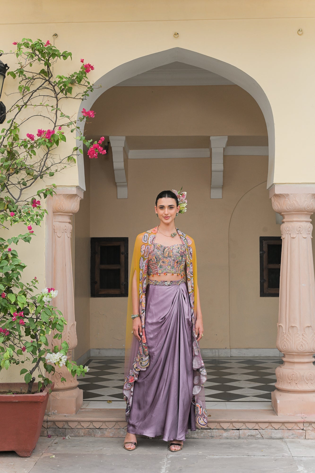 PURPLE COWL SATIN SKIRT WITH VIOLET BLOOM HIGHLIGHT CORSET BLOUSE AND DUAL APPLIQUÉ HIGHLIGHT CAPE SET