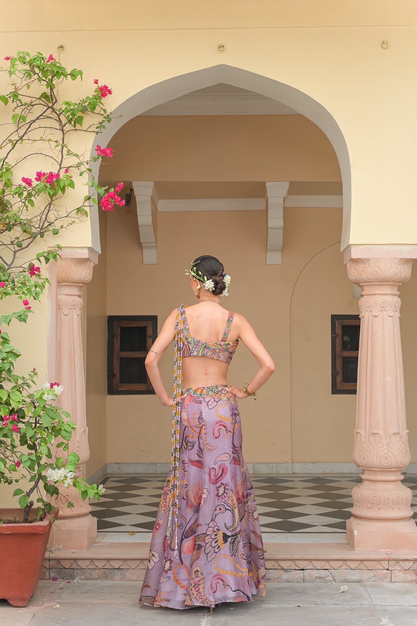 VOILET BLOOM FISH TAIL SKIRT WITH ATTACHED TASSEL. PALLA AND VIOLET BLOOM EMBROIDERED CORSET BLOUSE