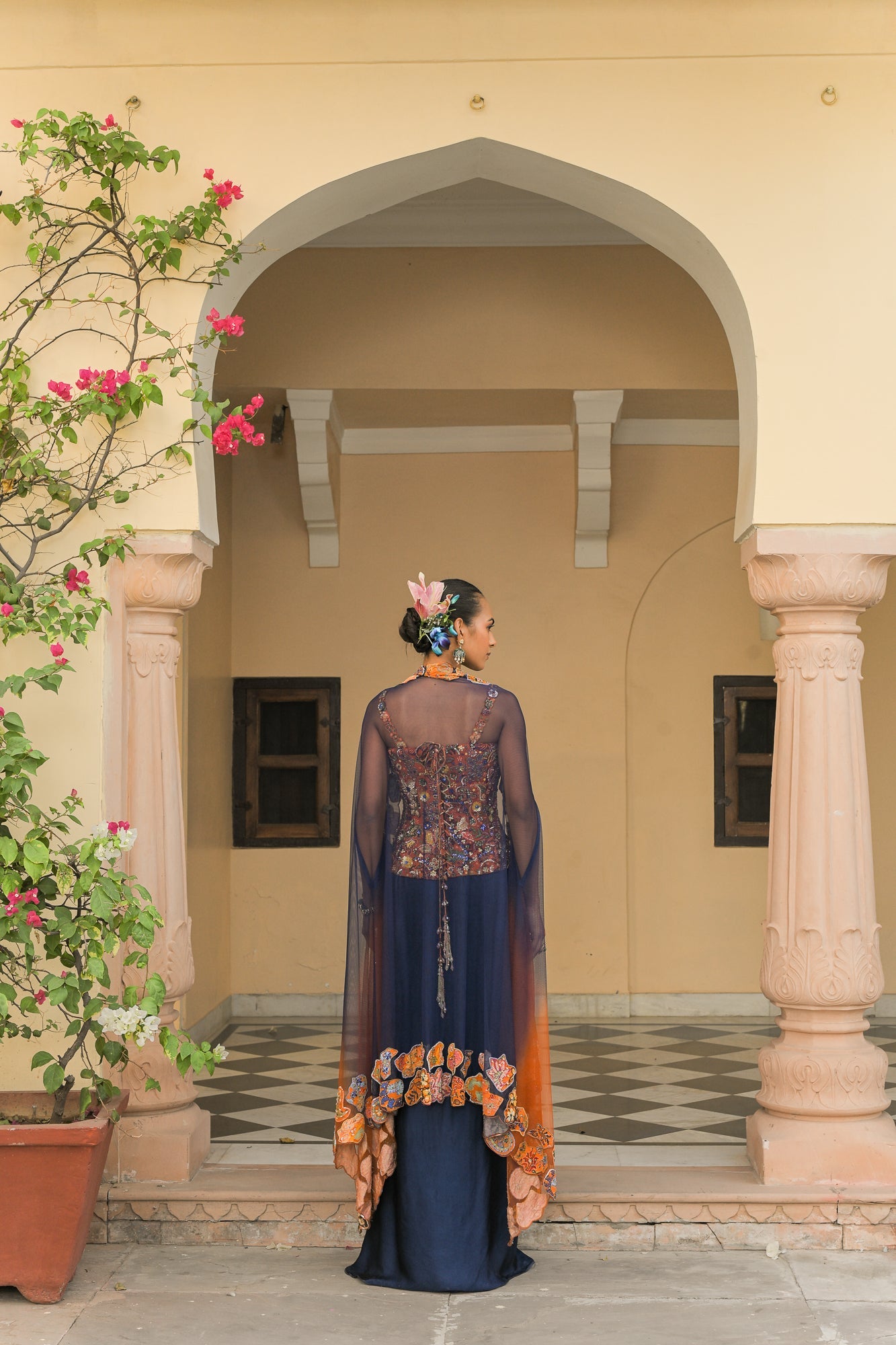 AMBER BLOOM HIGHLIGHT CORSET PAIRED WITH NAVY BLUE SATIN COWL SKIRT WITH DUAL APPLIQUÉ HIGHLIGHT CAPE SET