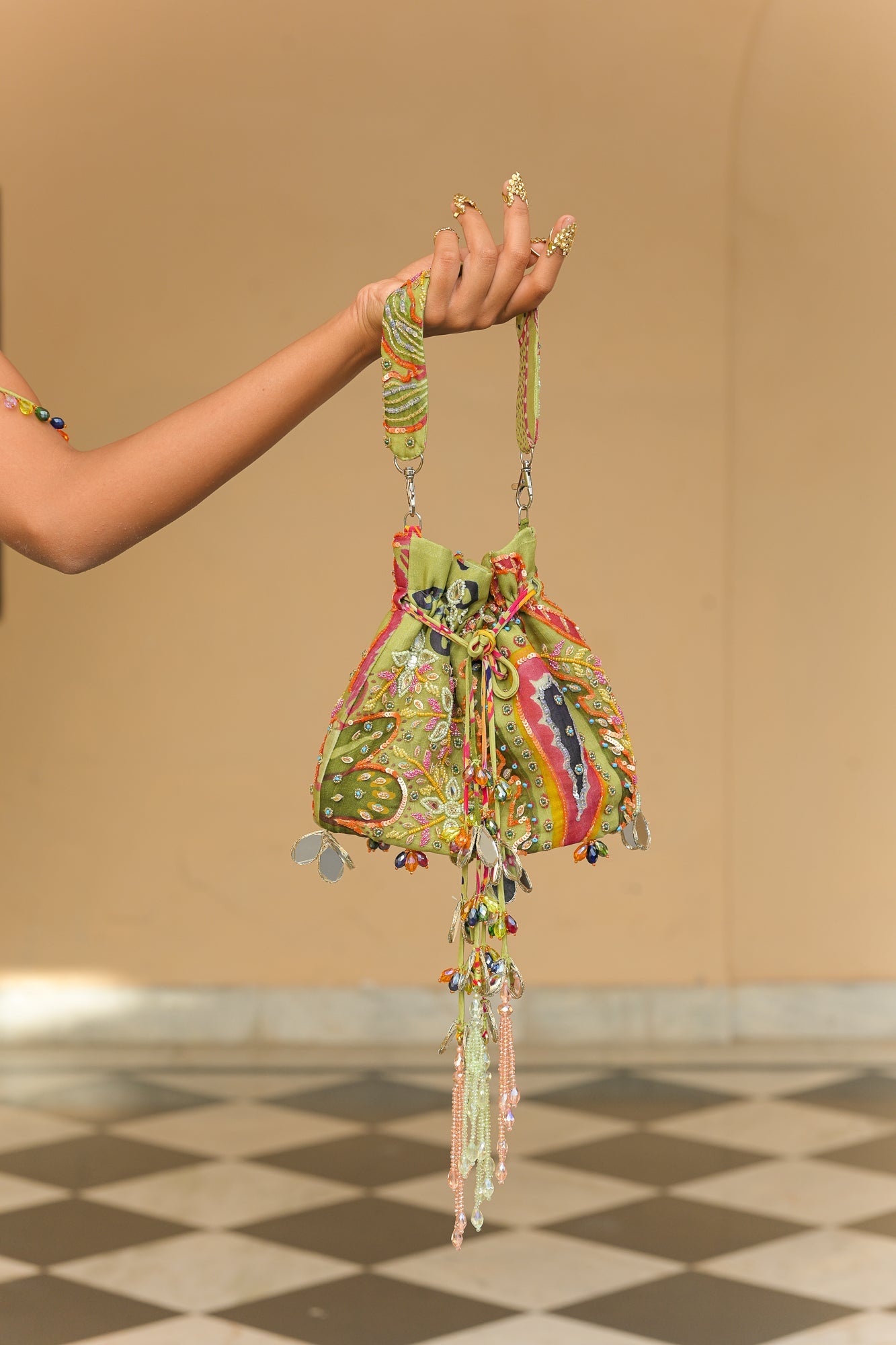 OLIVE BLOOM MIRROR WORK TASSEL POTLI