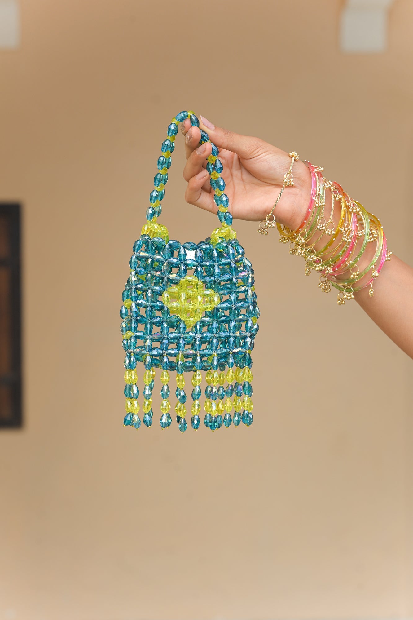CRYTSAL IRIS MIST TASSEL POTLI