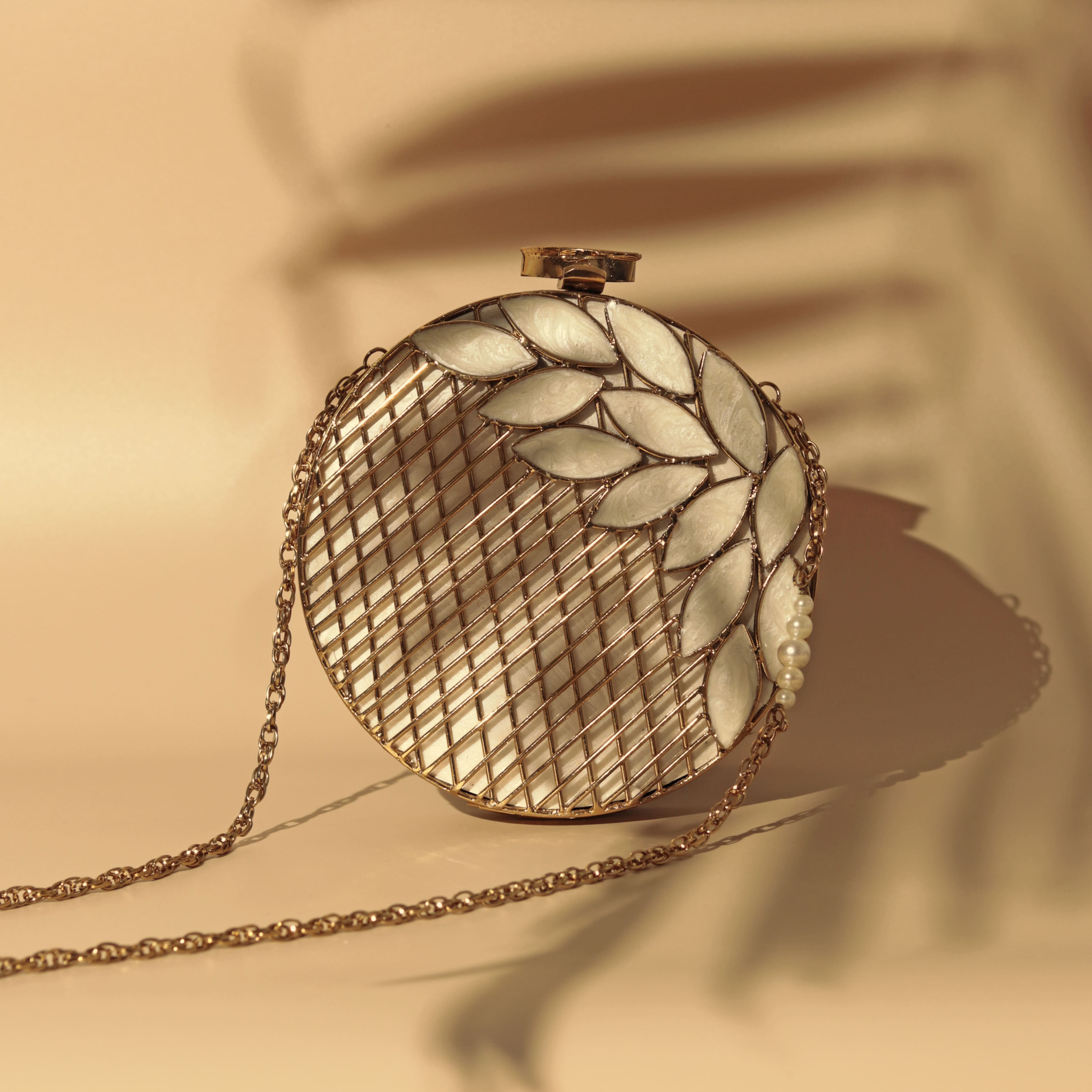 THE TAN CLAN Jannat Intricate Brass Work with Mother of Pearl Clutch