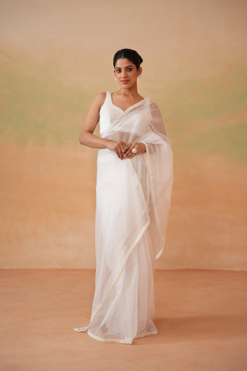 Ivory Blouse And Stitched Saree