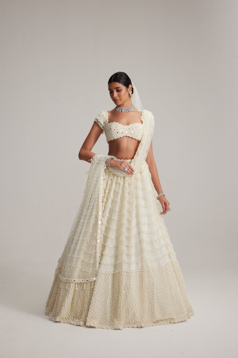 Off White Mirror and Pearl Drop Bridal lehenga set with Veil