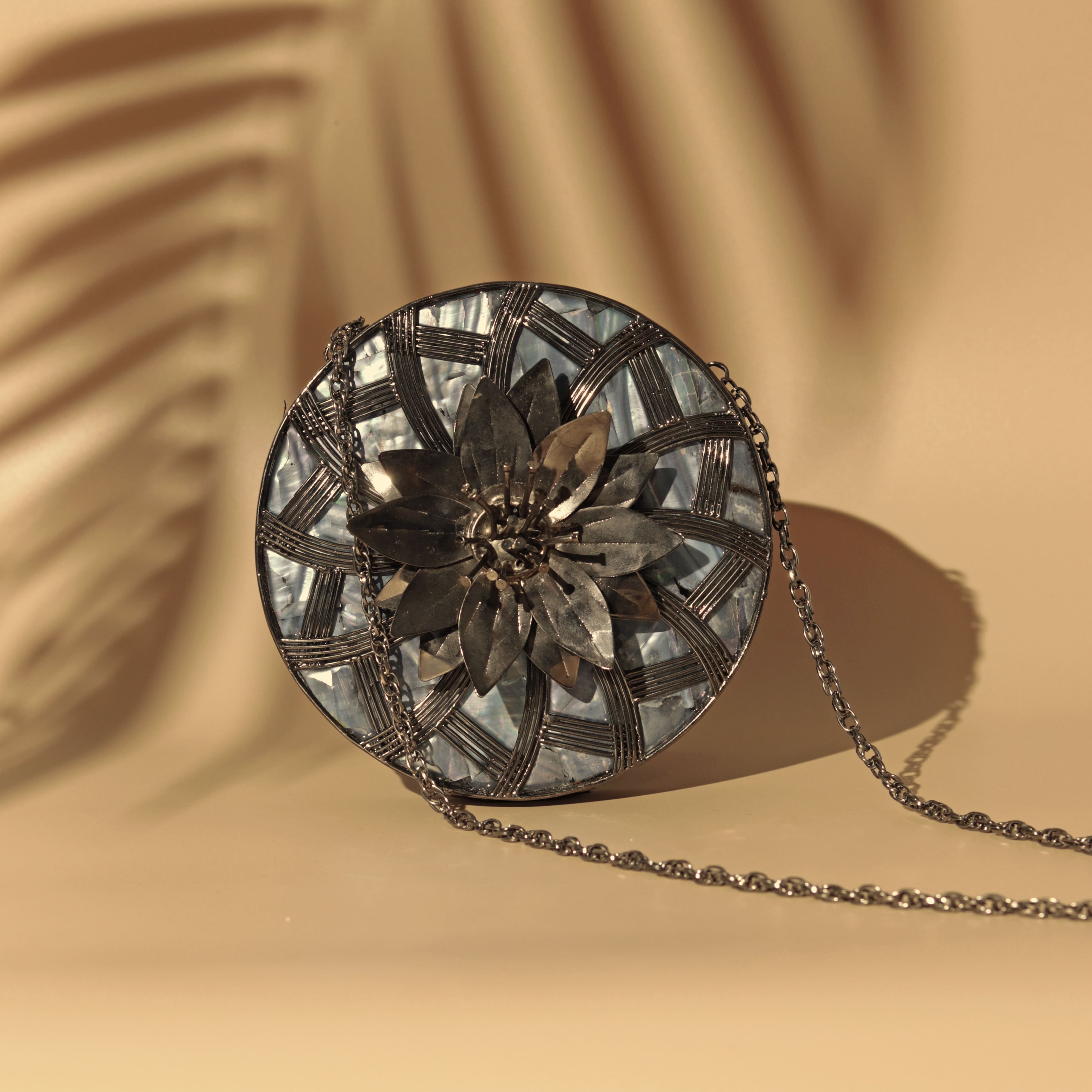 THE TAN CLAN Laila Intricate Brass Work with Mother of Pearl Clutch