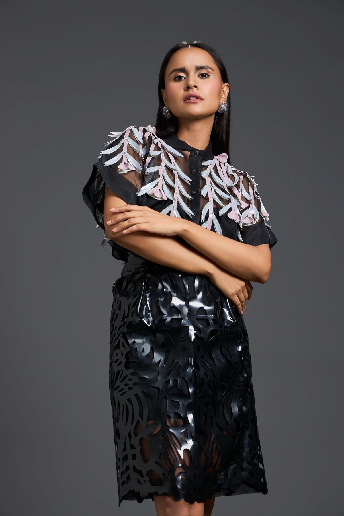 A Sheer Blouse With Layered Floral Patchwork Applique