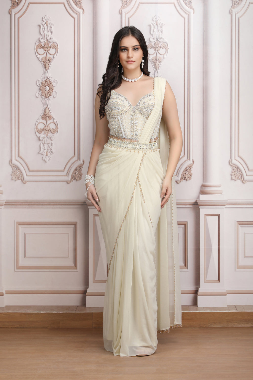 A Fluid Ivory Saree With Embroidered Blouse
