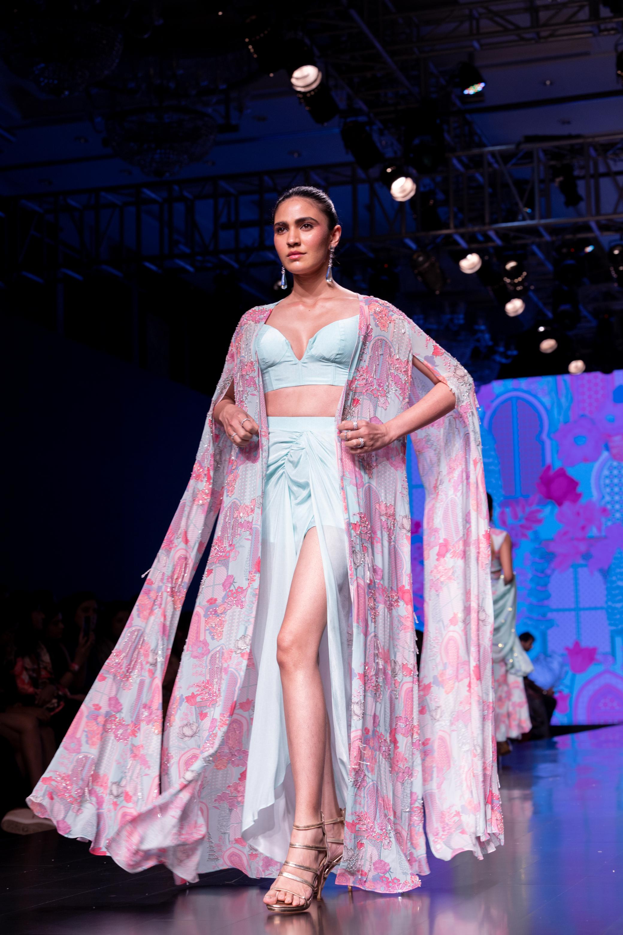 Powder Blue Blouse With Dhoti Skirt & Printed Embroidered Cape