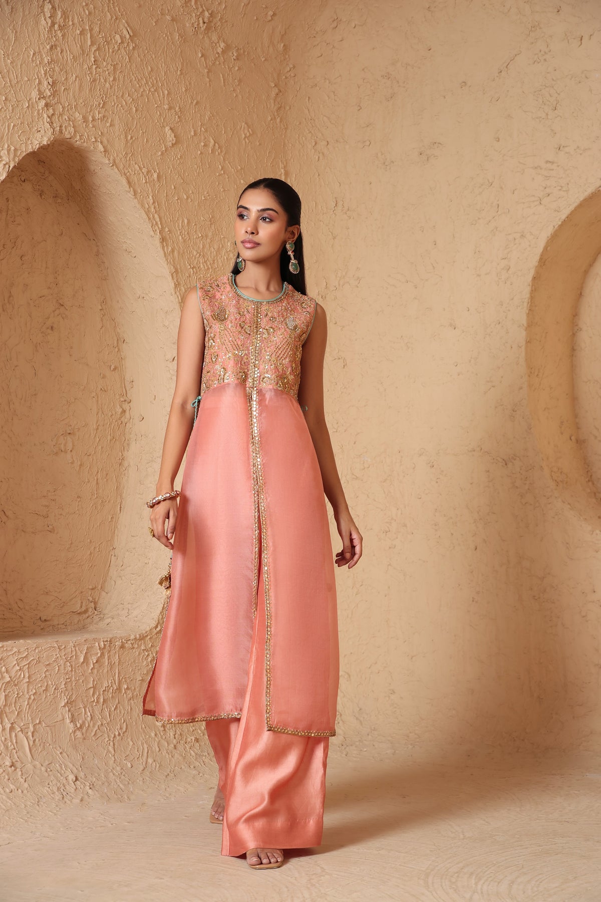 Mehrang Peach Tie-up Sleeveless Kurta Set