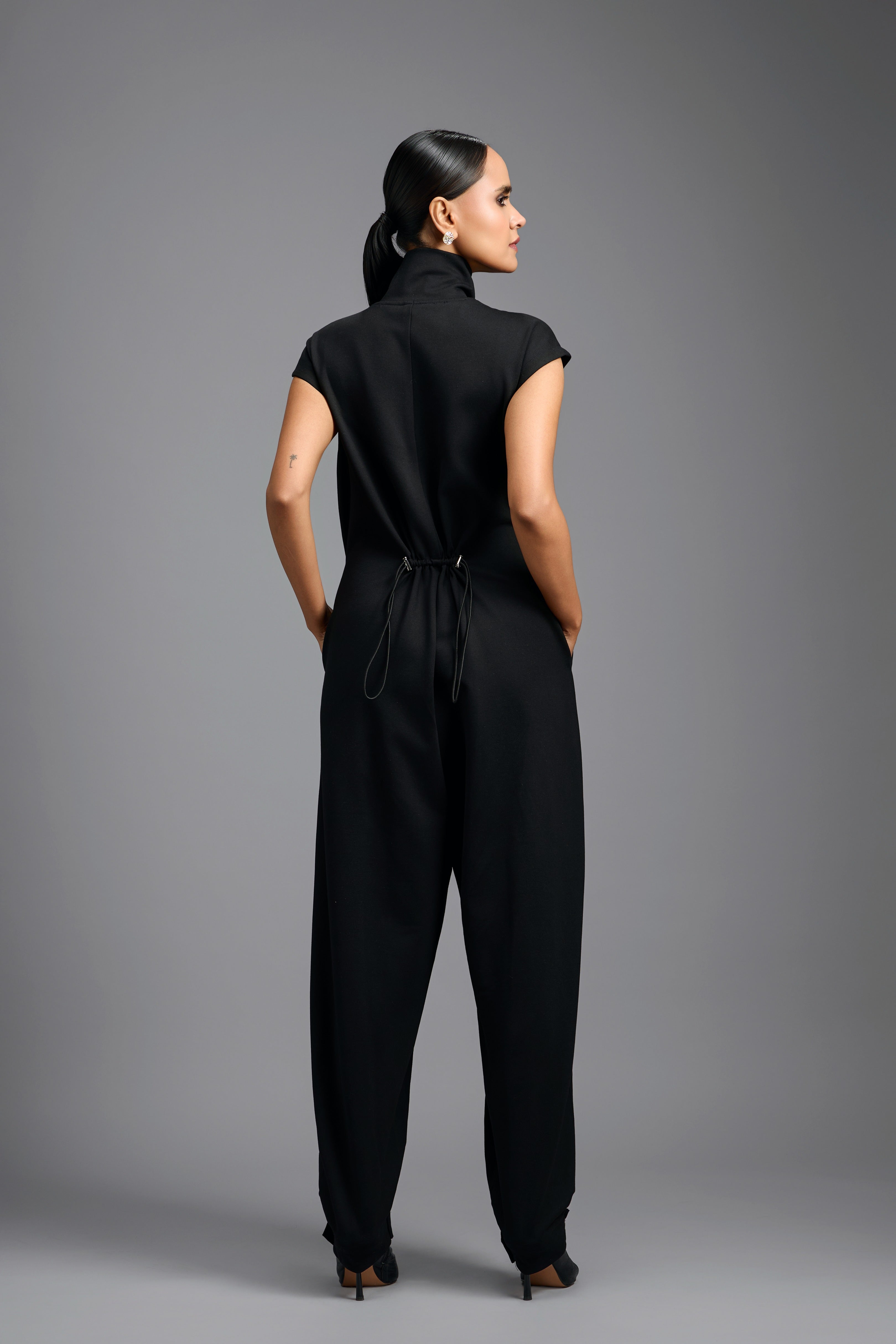 Black High-Neck Jumpsuit with Woven Leather Panel