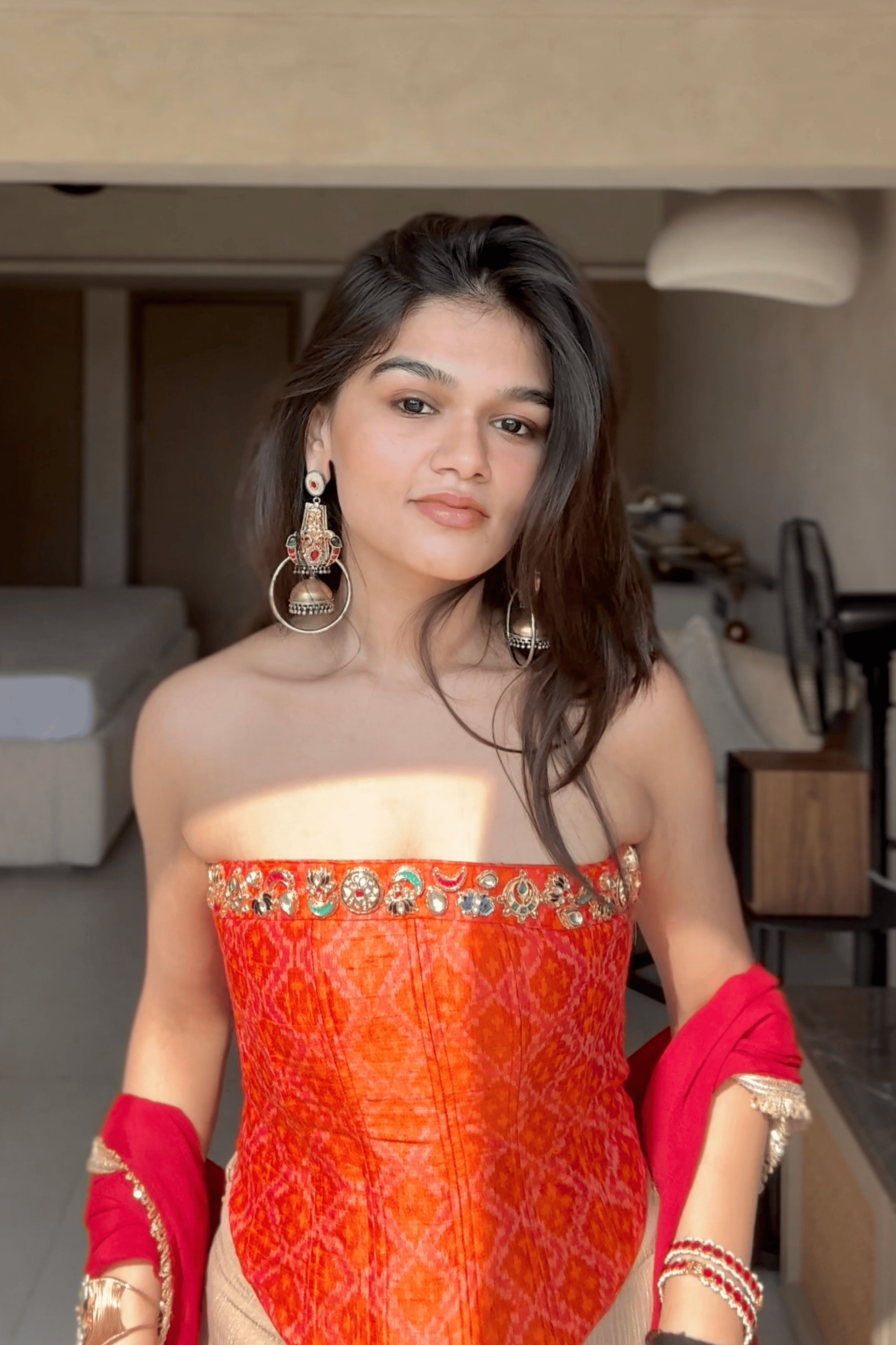Ruhani - Rose Gold Fishcut Lehenga Set with Orange Hand Embroidered Ikat Corset