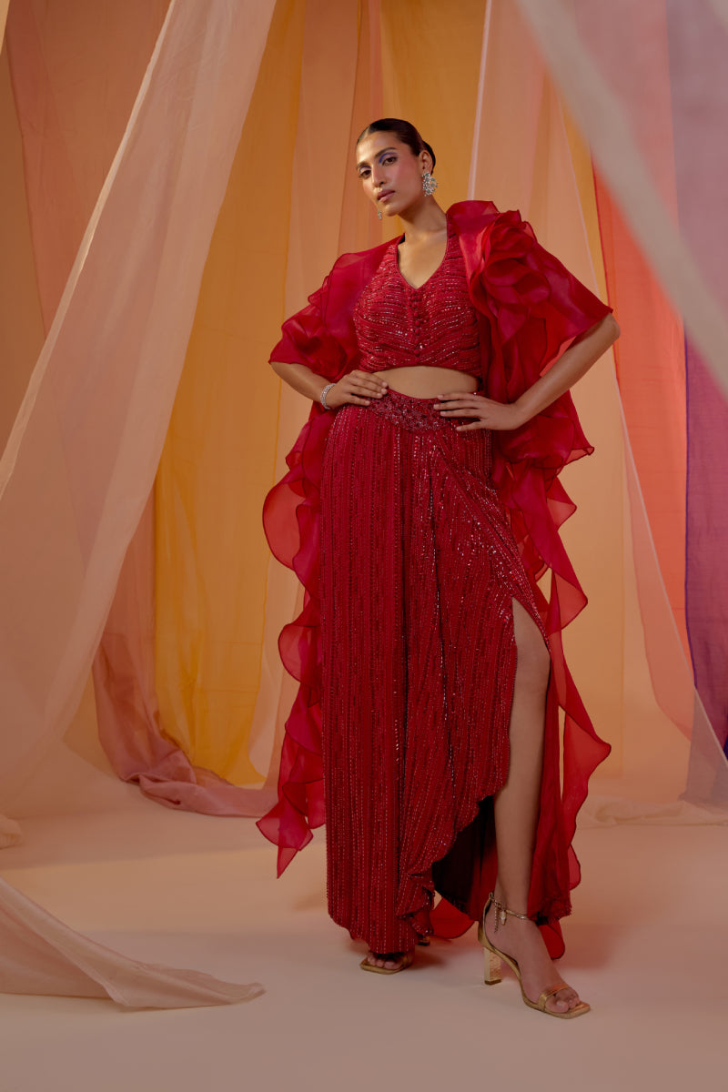 Ruby Red Fully Embroidered Halter Blouse With Drape Skirt And Ruffle Organza Cape