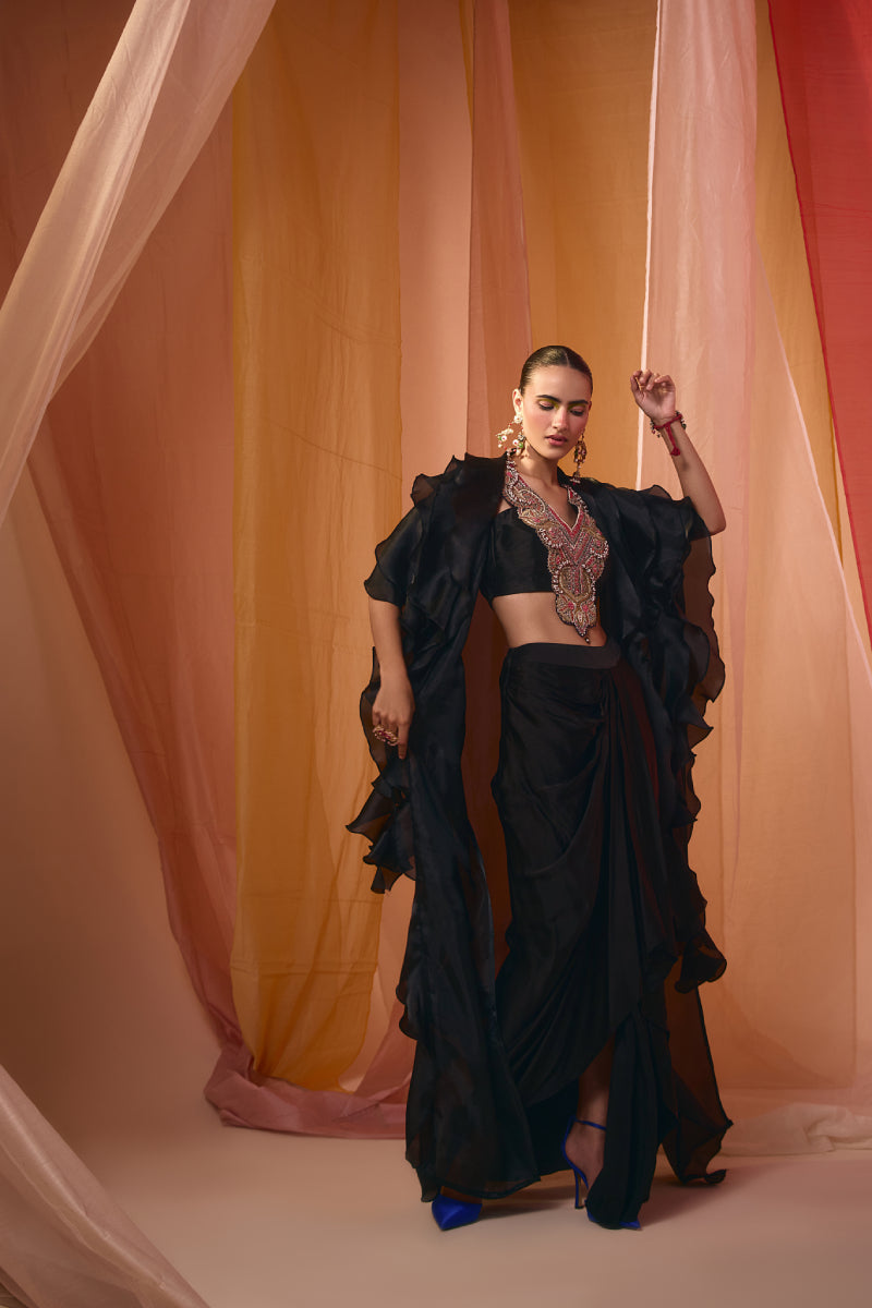 Black Ruffle Cape With Embroidered Neck Detail Blouse And Drape  Skirt