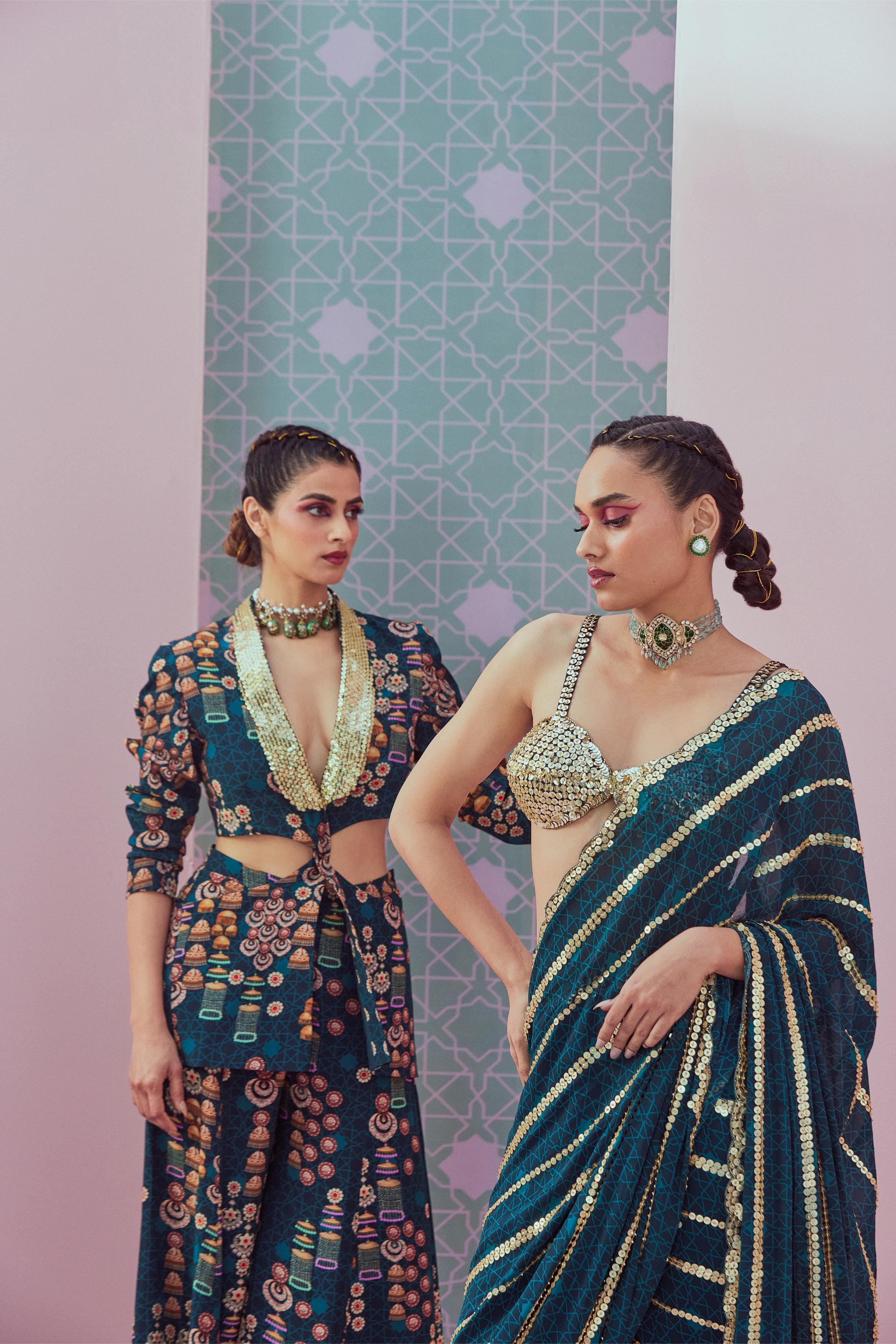 Embellished blouse paired with emrald green pre stitched saree