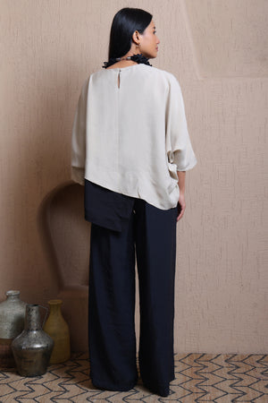 Asymmetric layered top - Meiala