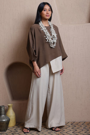 Asymmetric layered top - Meiala