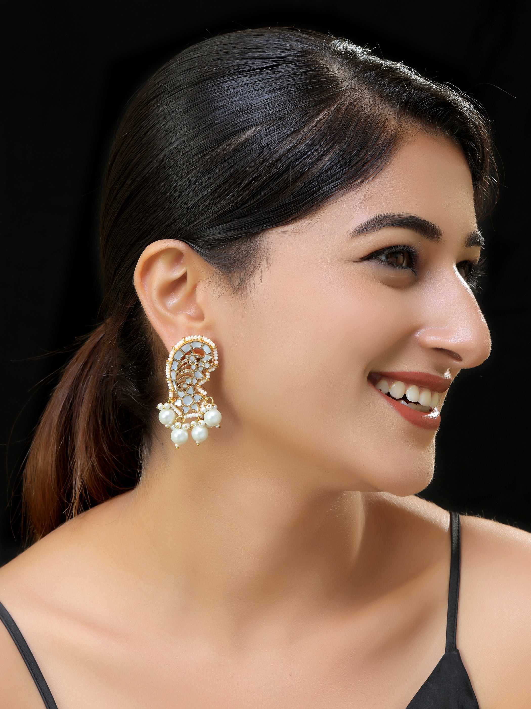 Gold finish Kundan mother of pearls Earrings