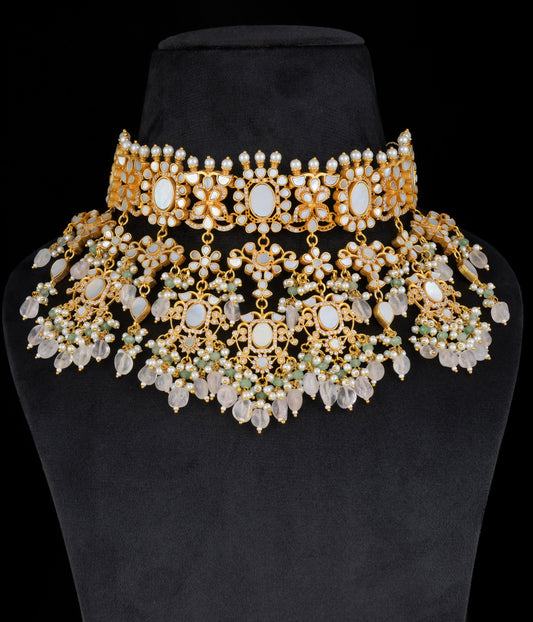 Gold finish Kundan and mother of pearls necklace set