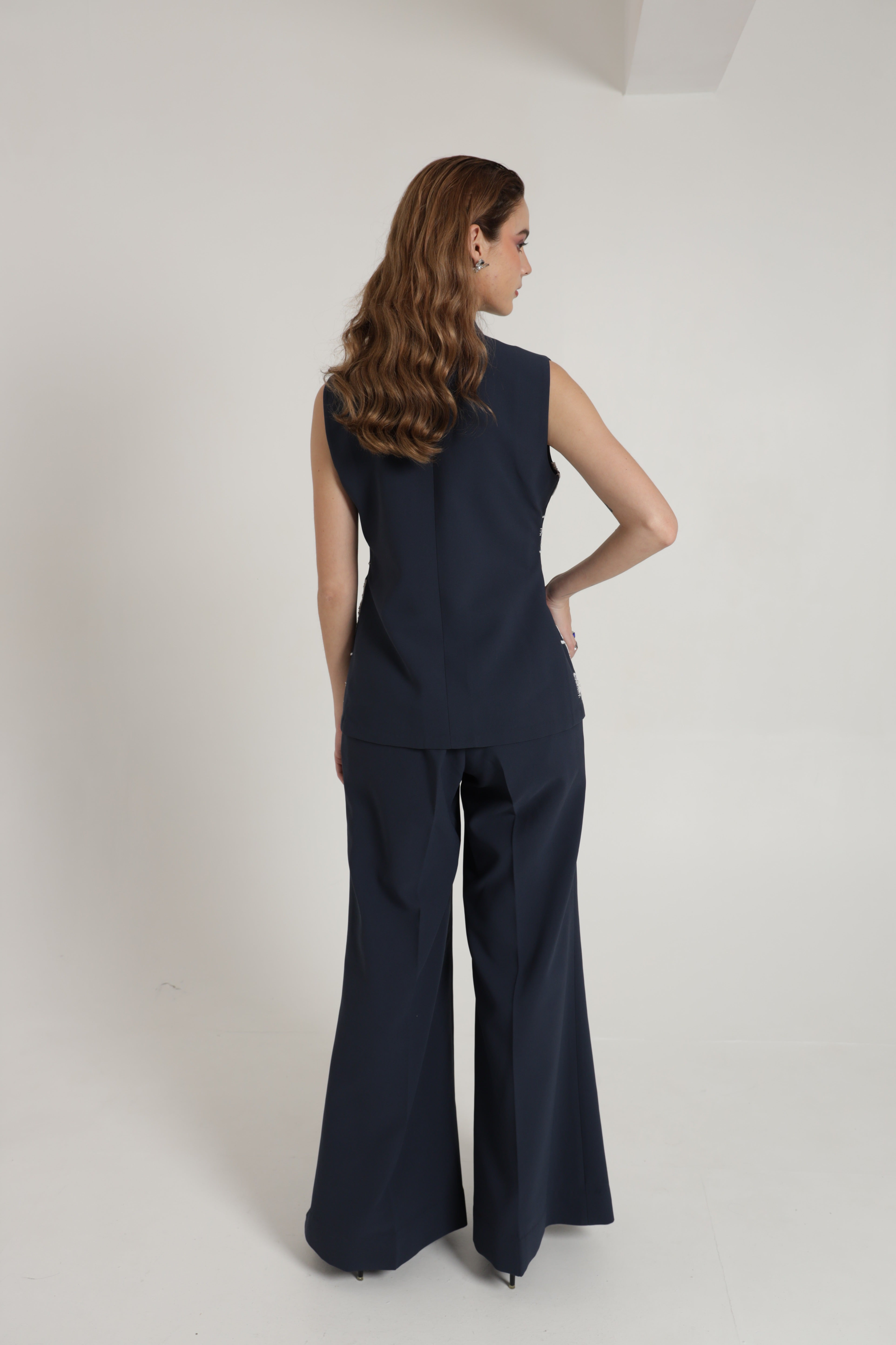 Dark blue sleeveless jacket with wide leg pant