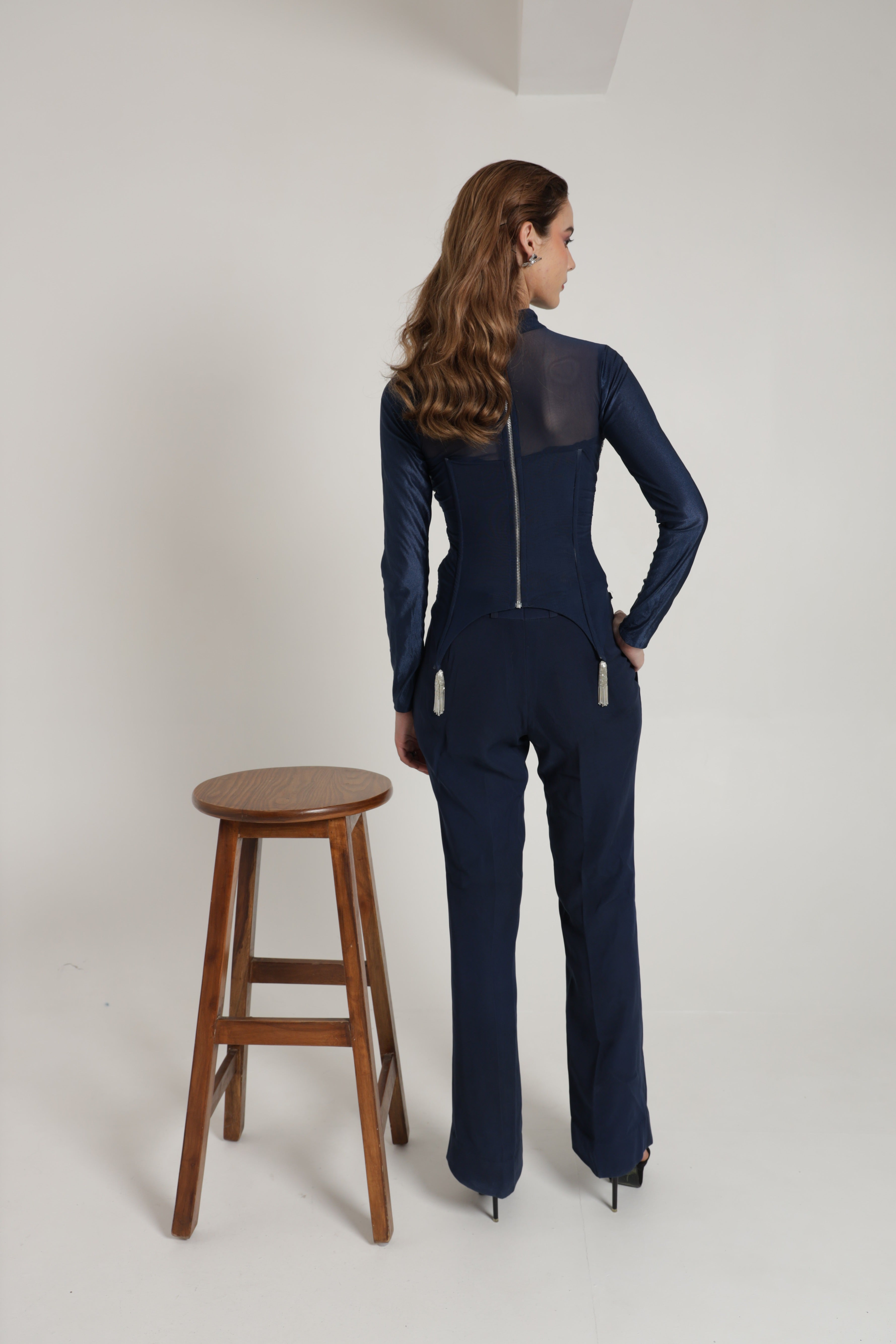 Dark blue high neck corset top with straigh pants