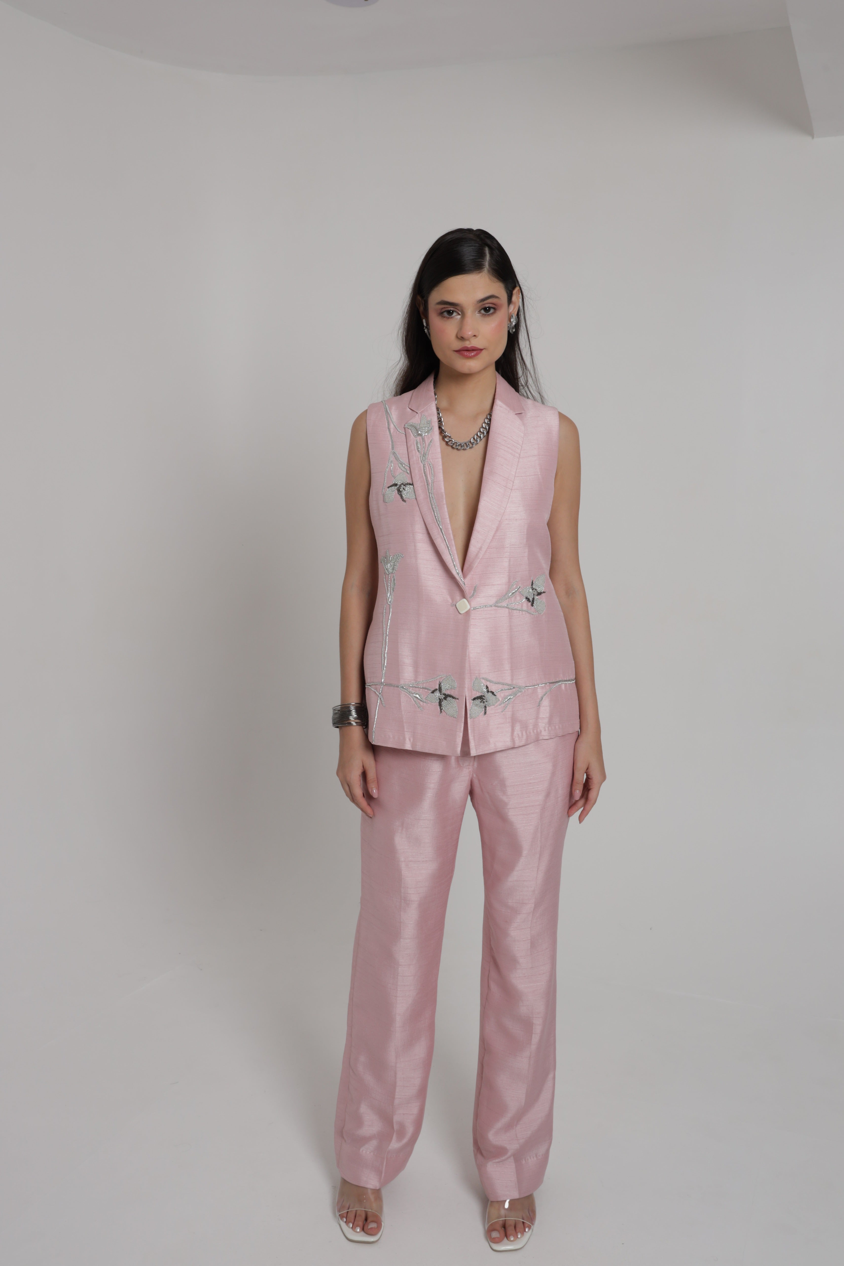 Light pink sleeveless jacket set with straight pant and bustier