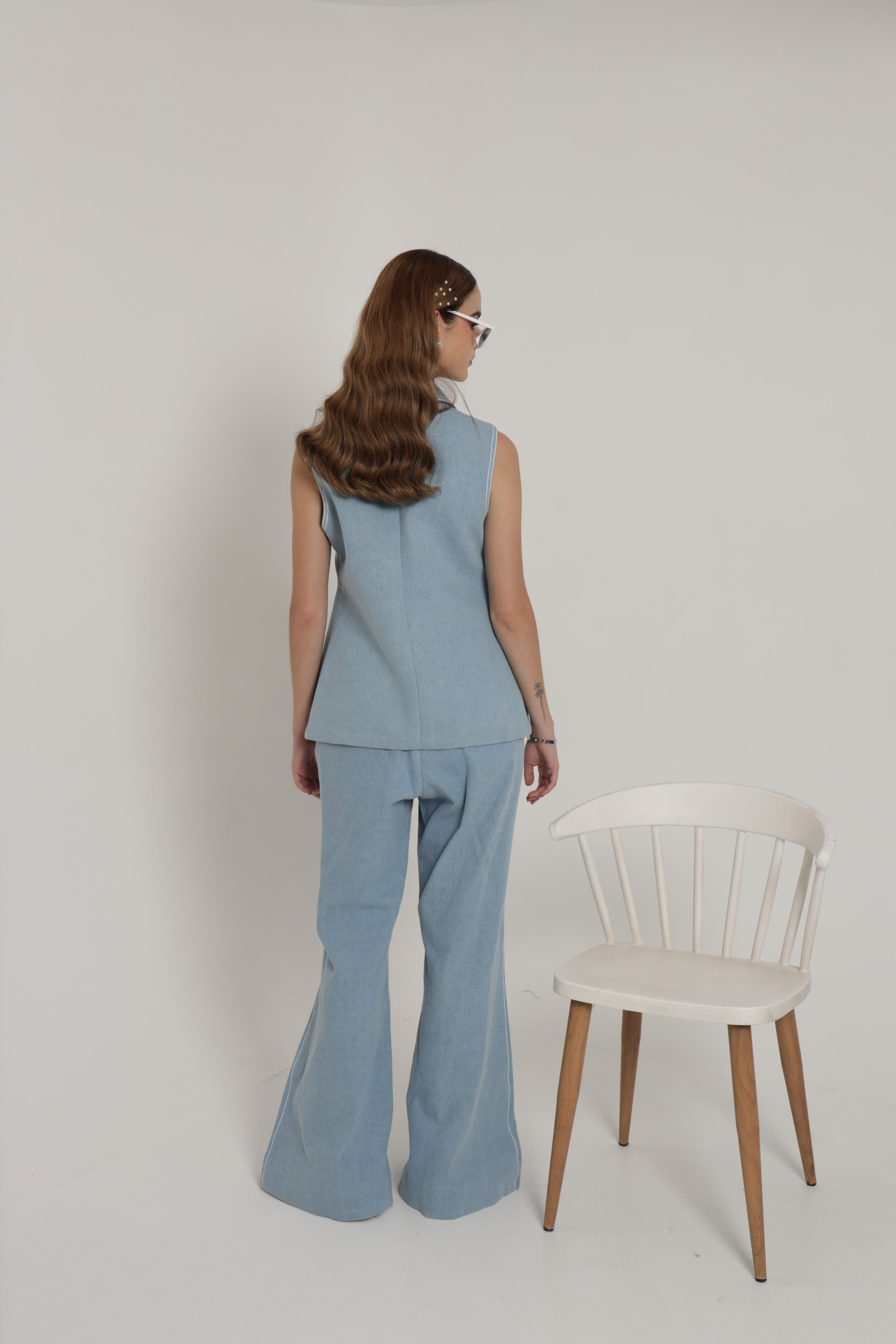 Light blue sleeveless jacket set with wide leg pants and bustier