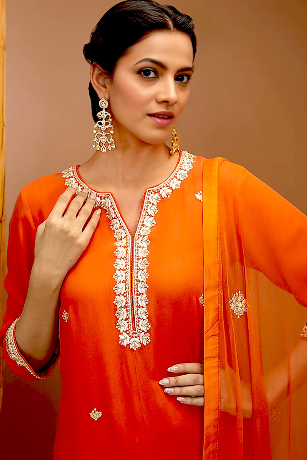 Gota Patti Embroidred kurta set in Tangy Red Color.