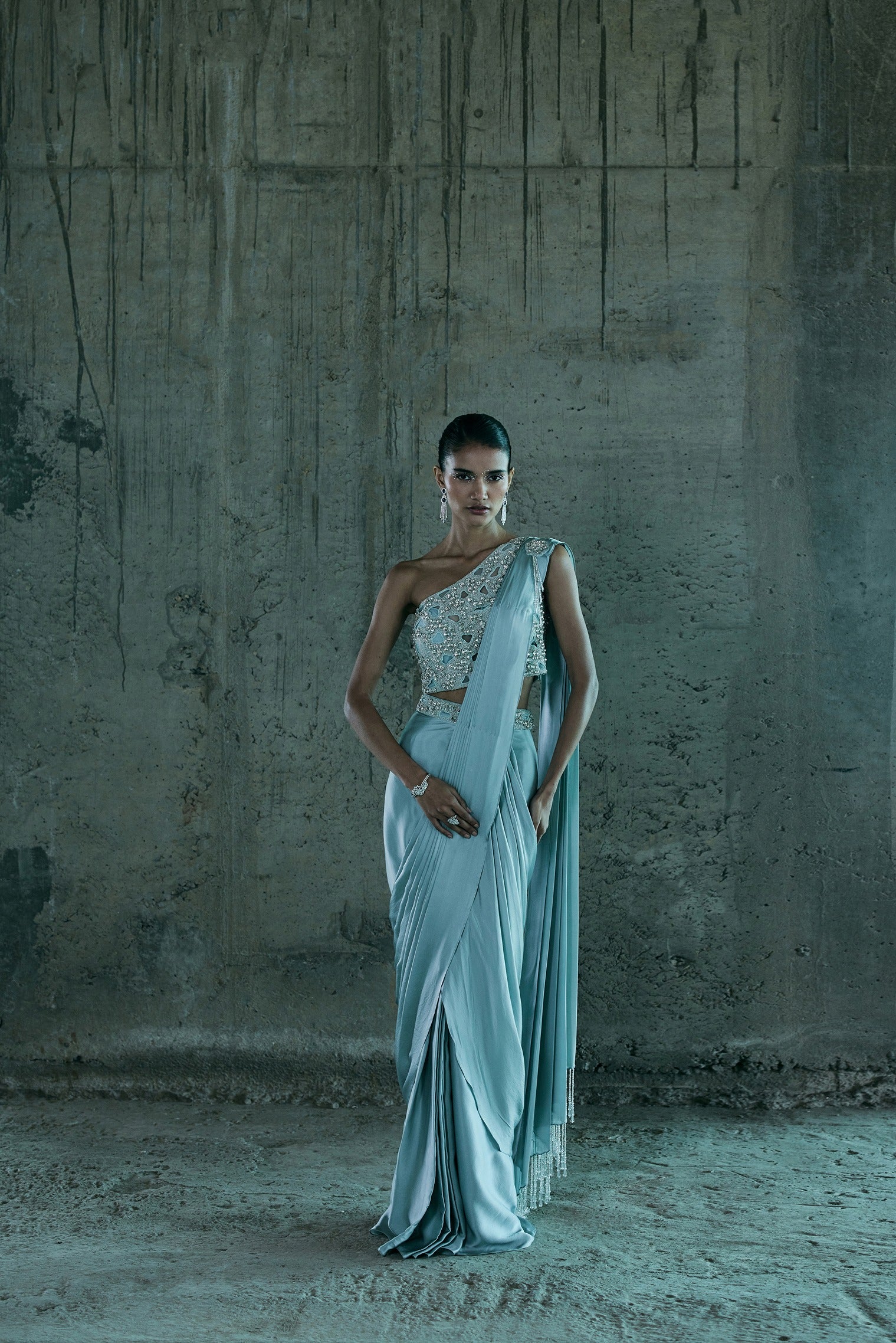 Ice Blue Stone Embellished Bustier Paired With Drape Saree