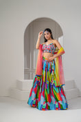 Load image into Gallery viewer, Multicoloured Soft Silk Zari Embroidered Lehenga Set.
