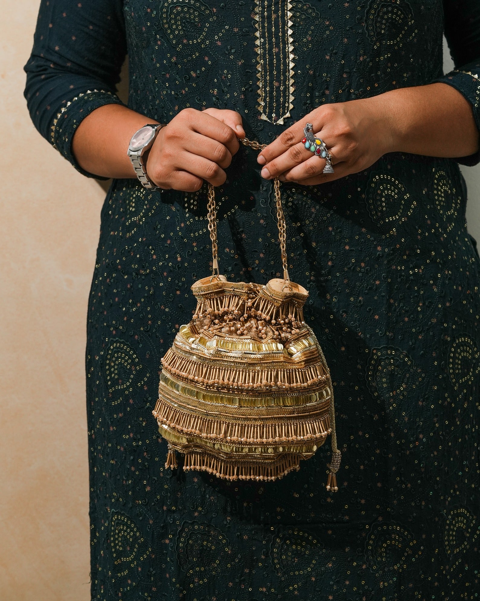 Golden Polma Tassel Potli