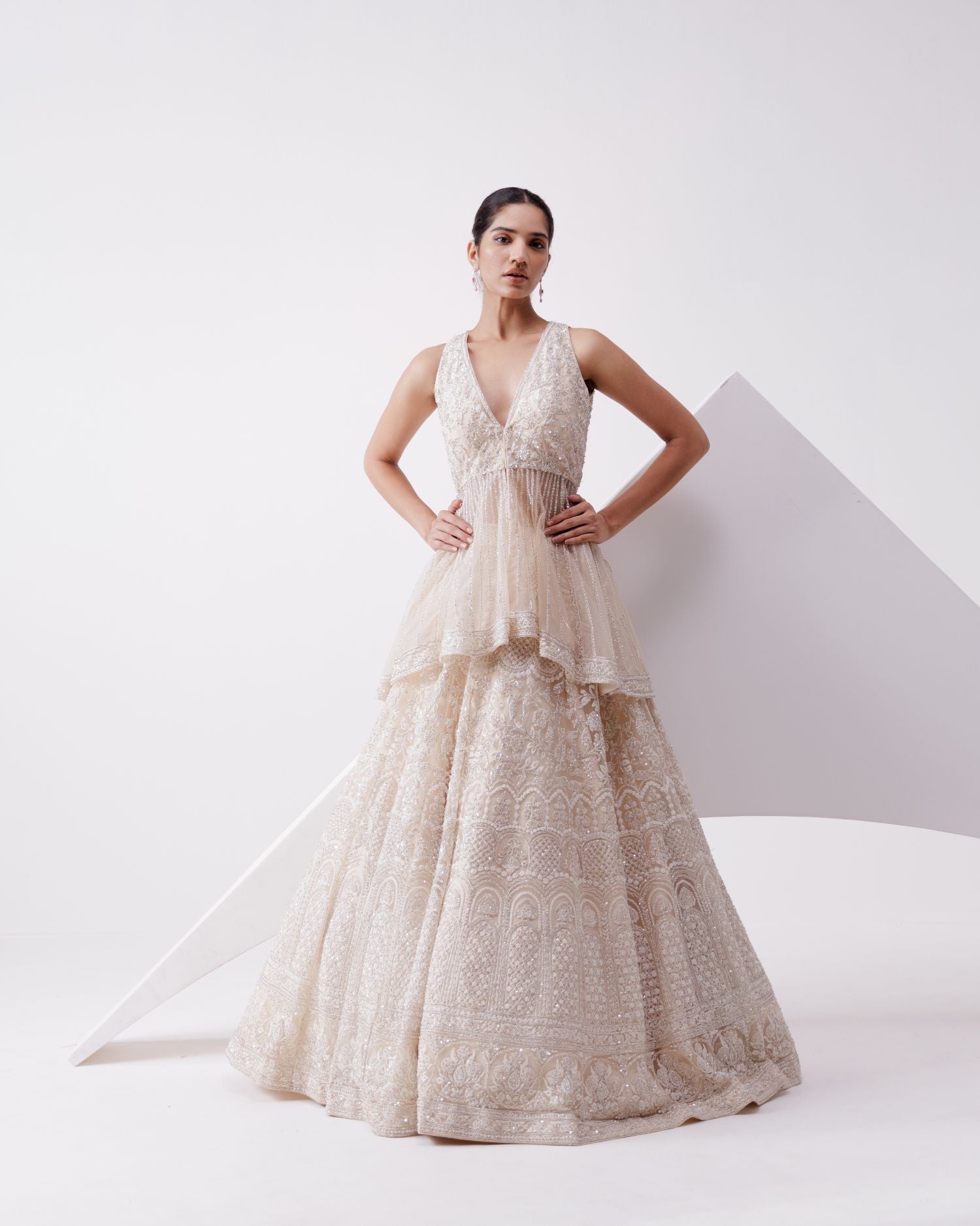 Beige Net Embroidered Lehenga With Peplum Jacket