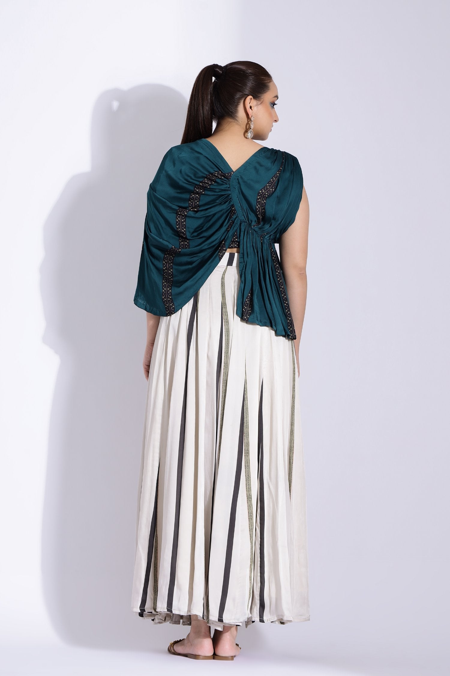 Drape Blouse With A Kalidar Skirt