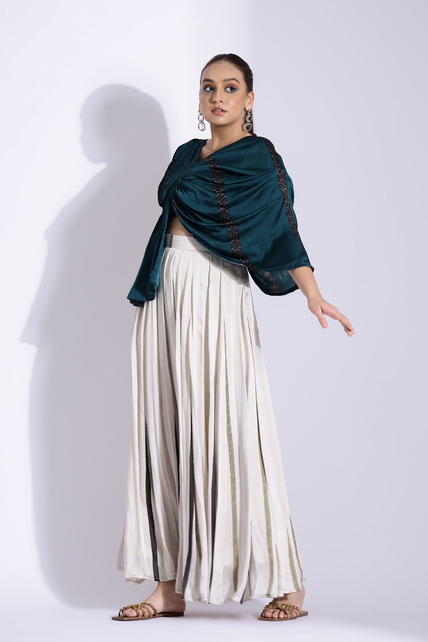 Drape Blouse With A Kalidar Skirt
