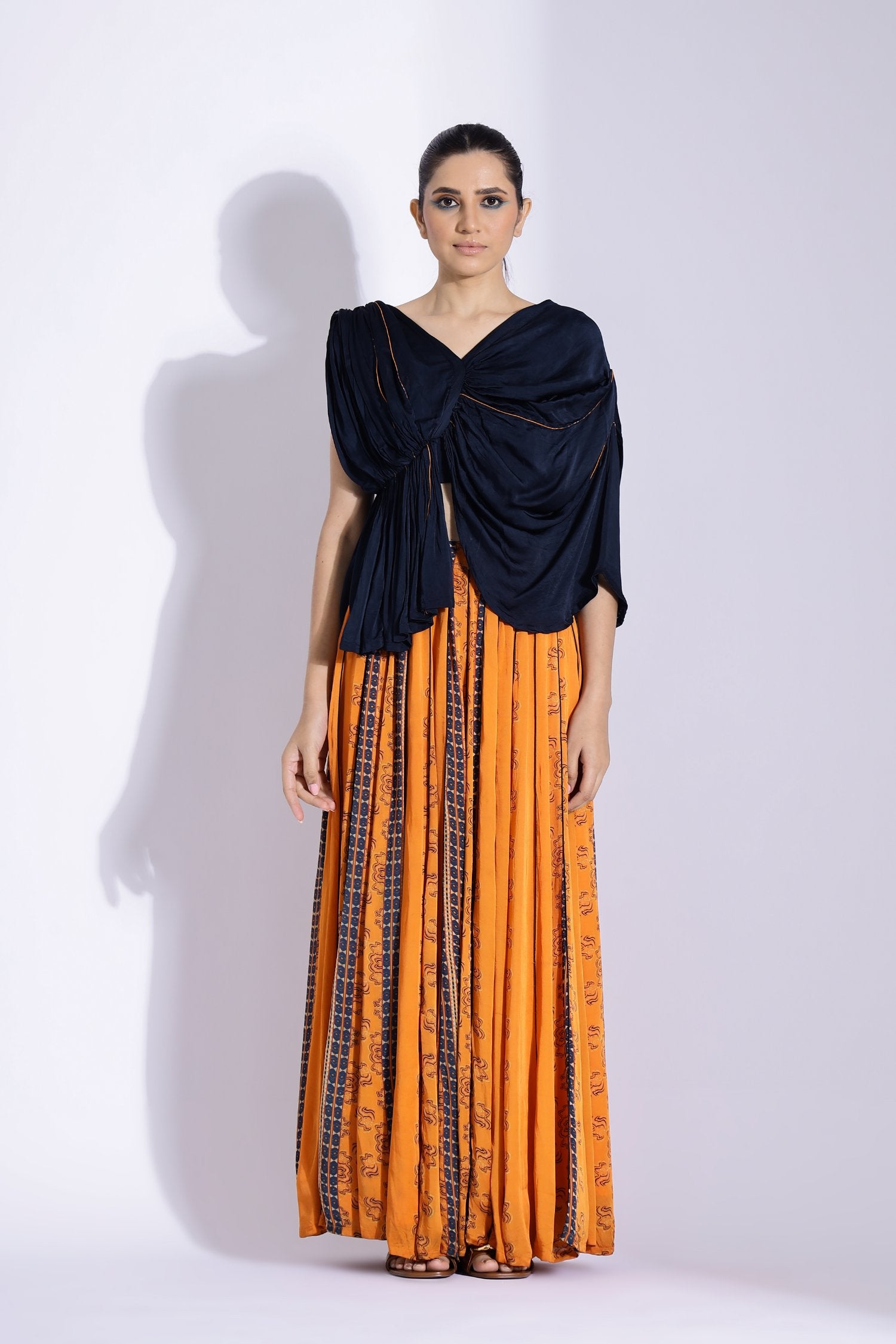 Drape Blouse With A Kalidar Skirt