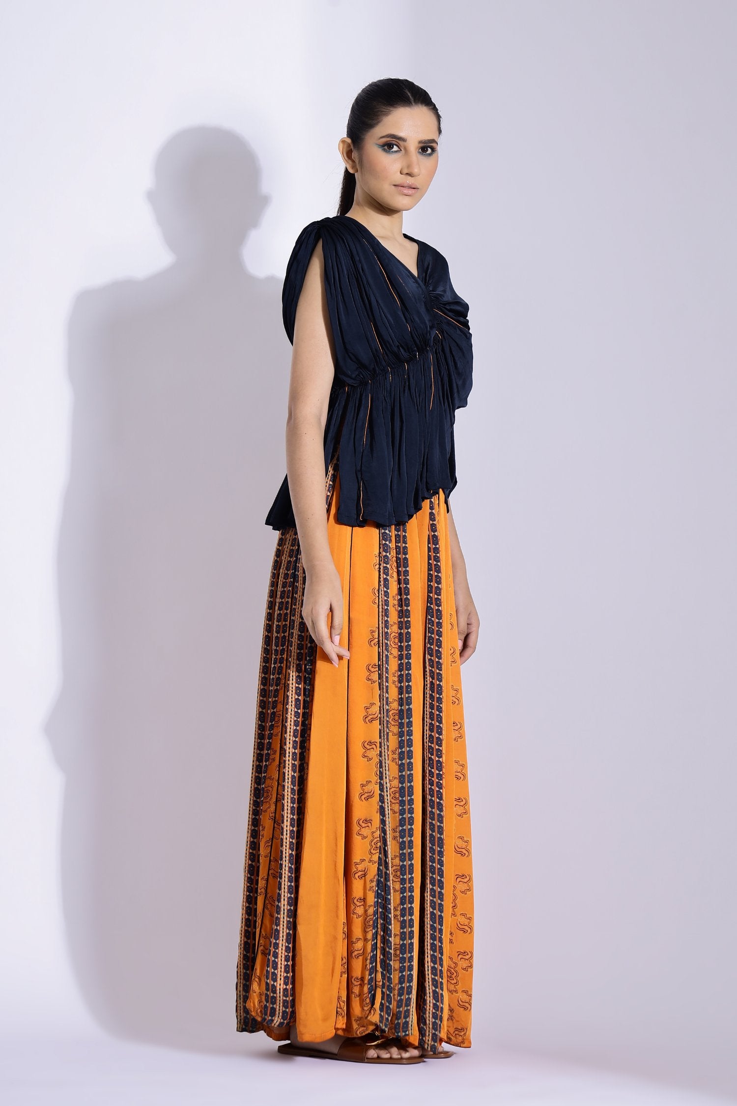 Drape Blouse With A Kalidar Skirt