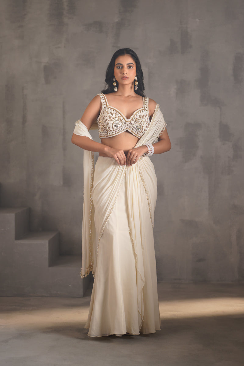 Ivory Embroidered Blouse And Stitched Draped Saree